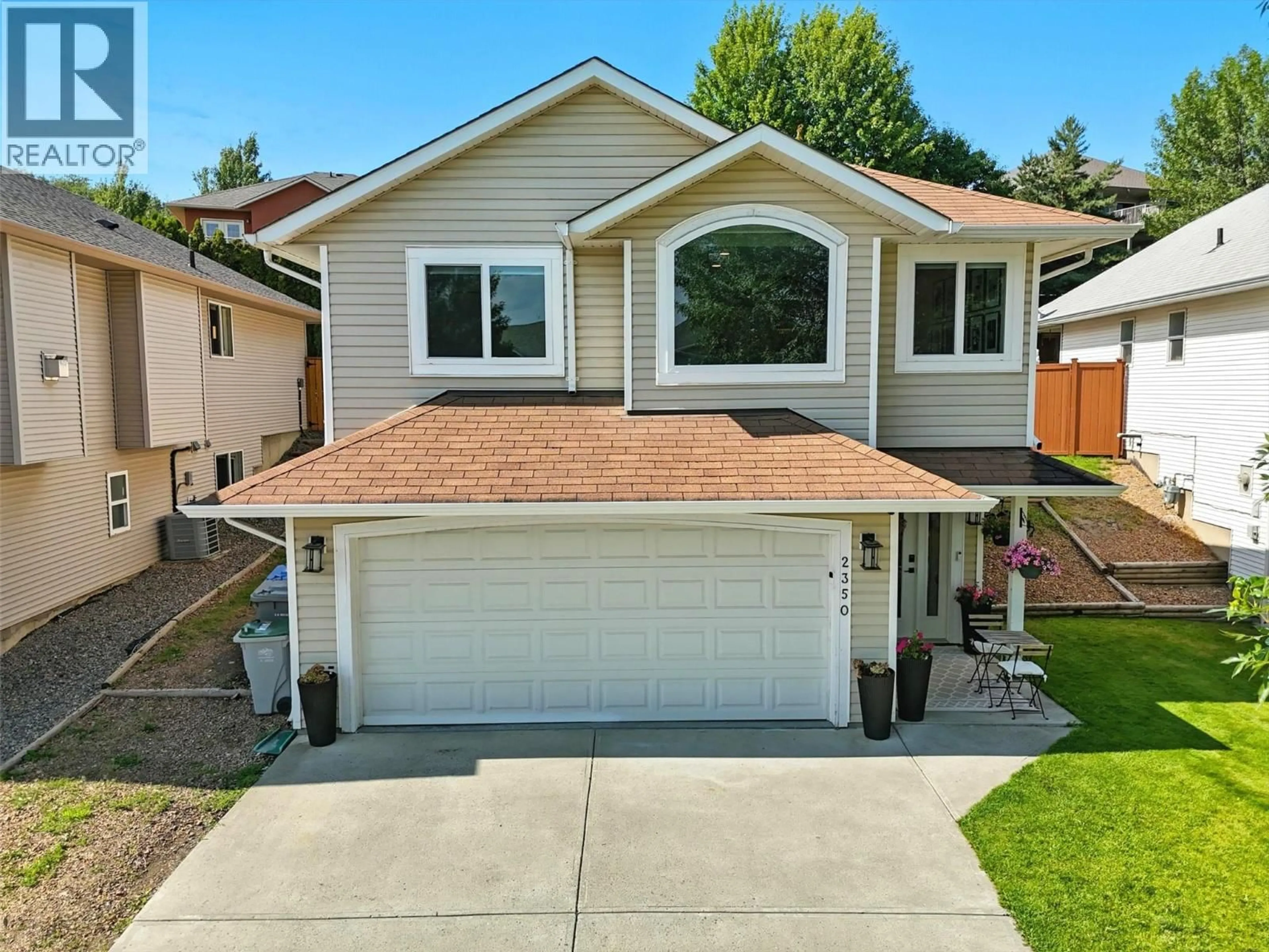 Home with vinyl exterior material, street for 2350 BRAMBLE LANE, Kamloops British Columbia V1S1Y6