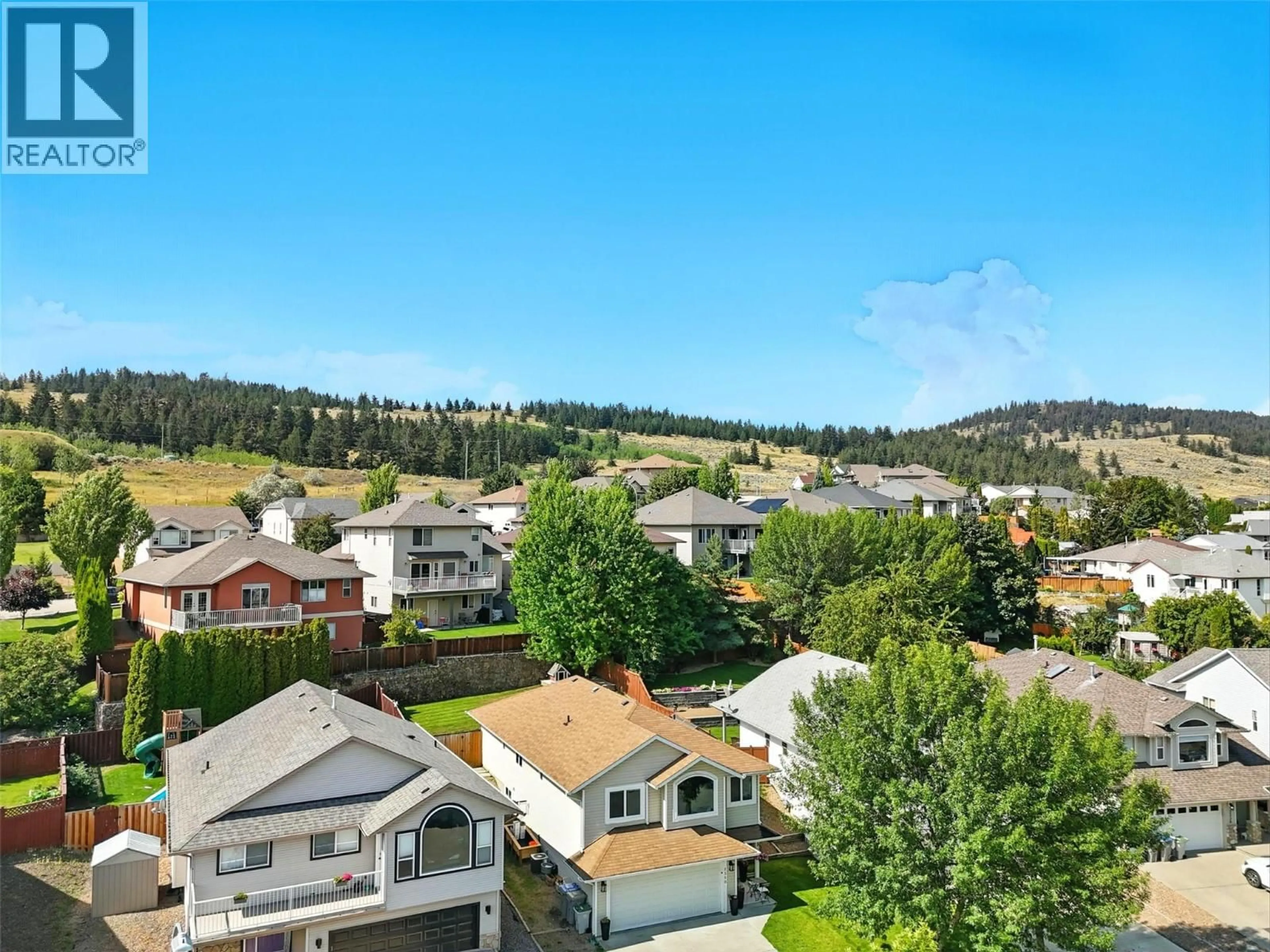 A pic from outside/outdoor area/front of a property/back of a property/a pic from drone, mountain view for 2350 BRAMBLE LANE, Kamloops British Columbia V1S1Y6