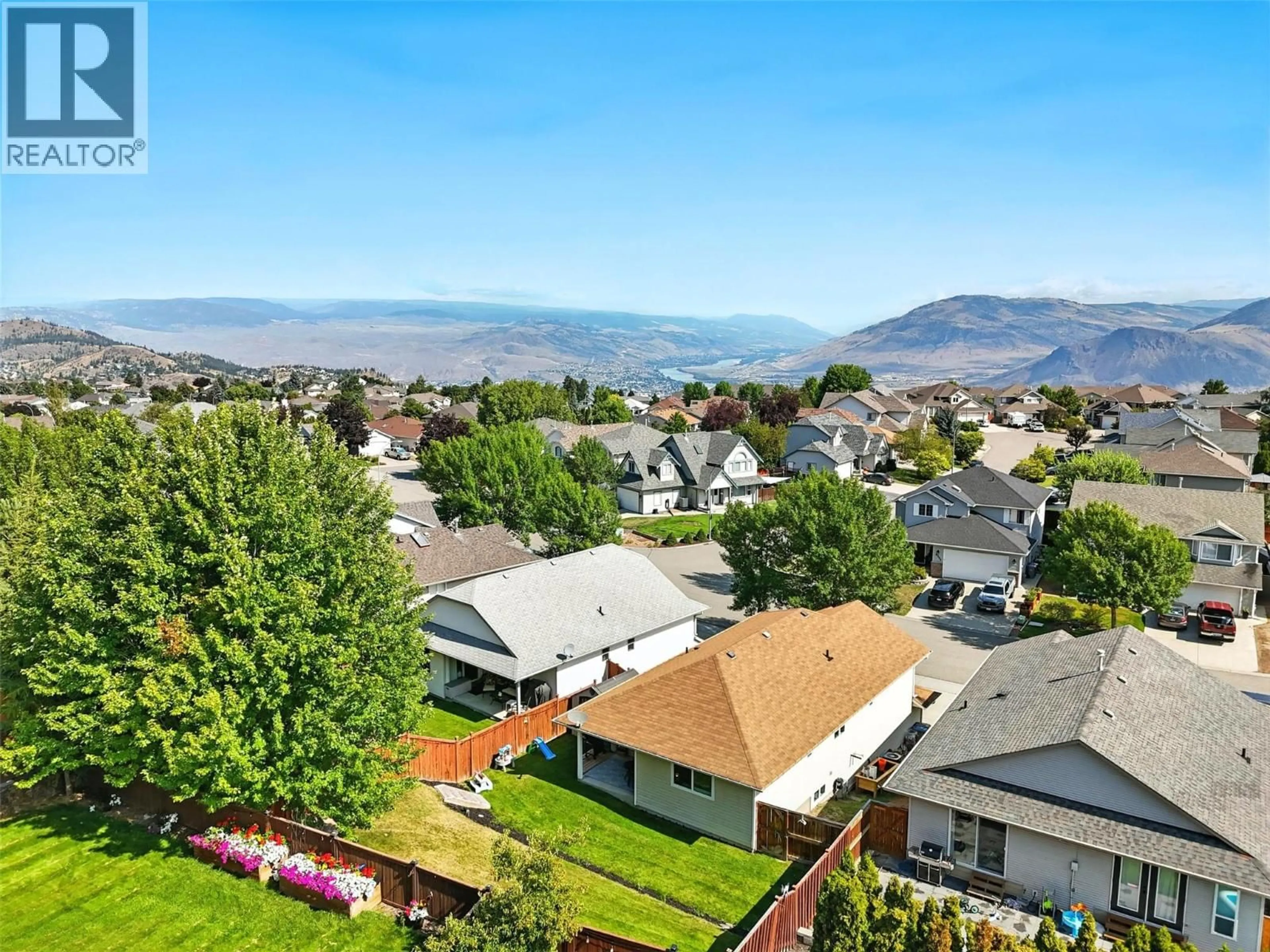 A pic from outside/outdoor area/front of a property/back of a property/a pic from drone, mountain view for 2350 BRAMBLE LANE, Kamloops British Columbia V1S1Y6