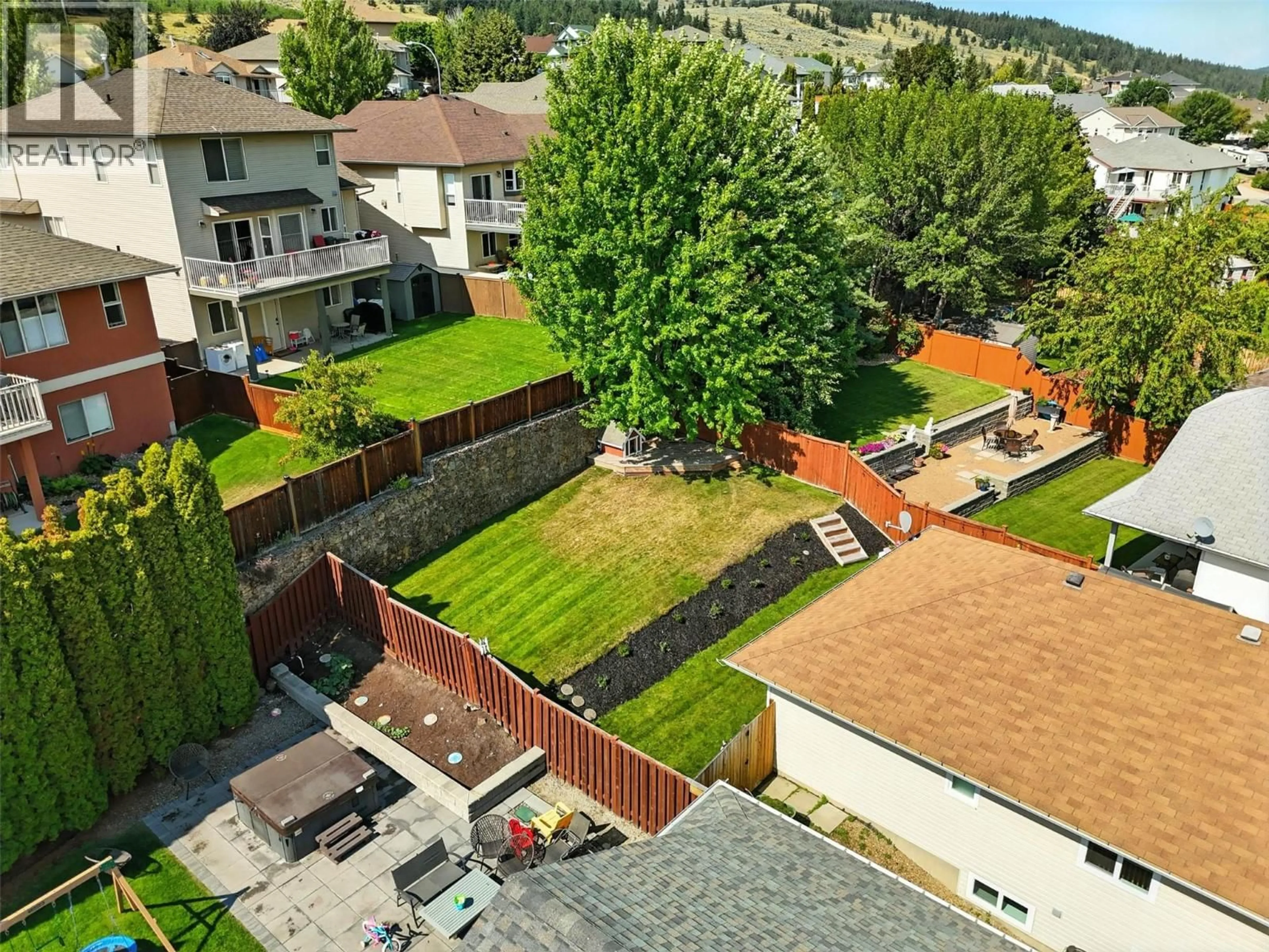 A pic from outside/outdoor area/front of a property/back of a property/a pic from drone, mountain view for 2350 BRAMBLE LANE, Kamloops British Columbia V1S1Y6