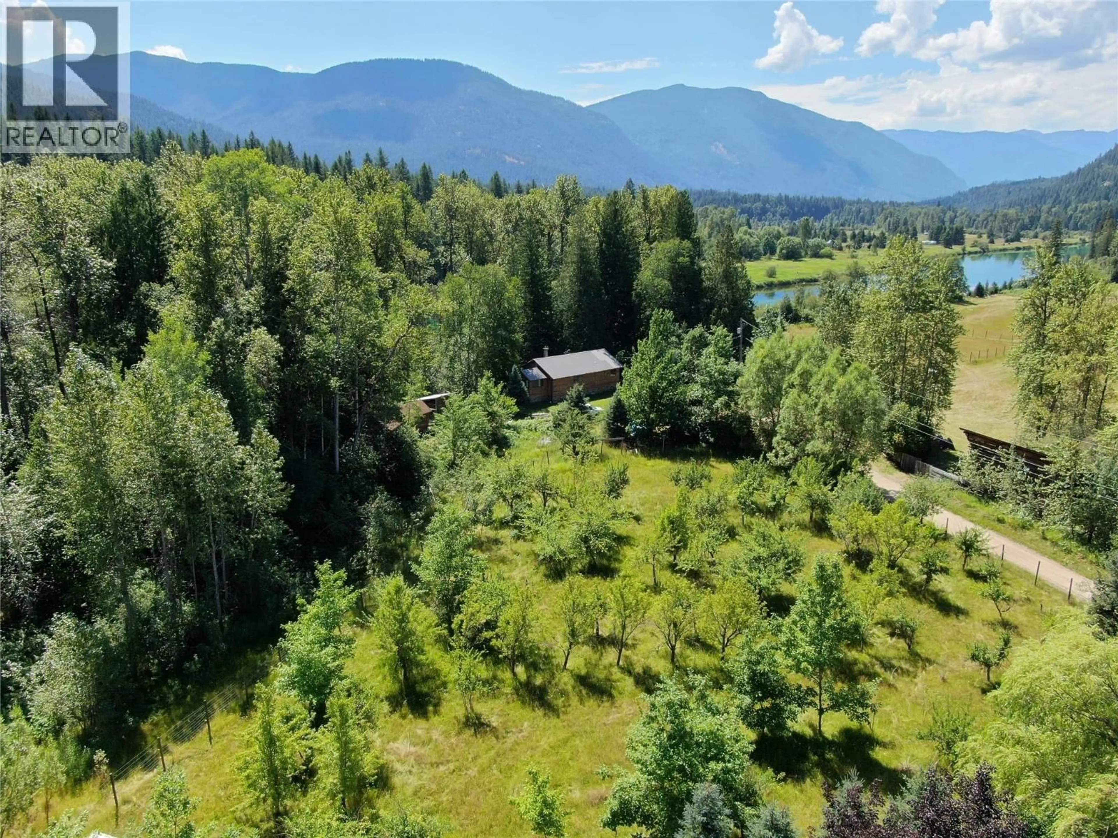 A pic from outside/outdoor area/front of a property/back of a property/a pic from drone, forest/trees view for 6268 PICARD ROAD, Appledale British Columbia V0G2J0
