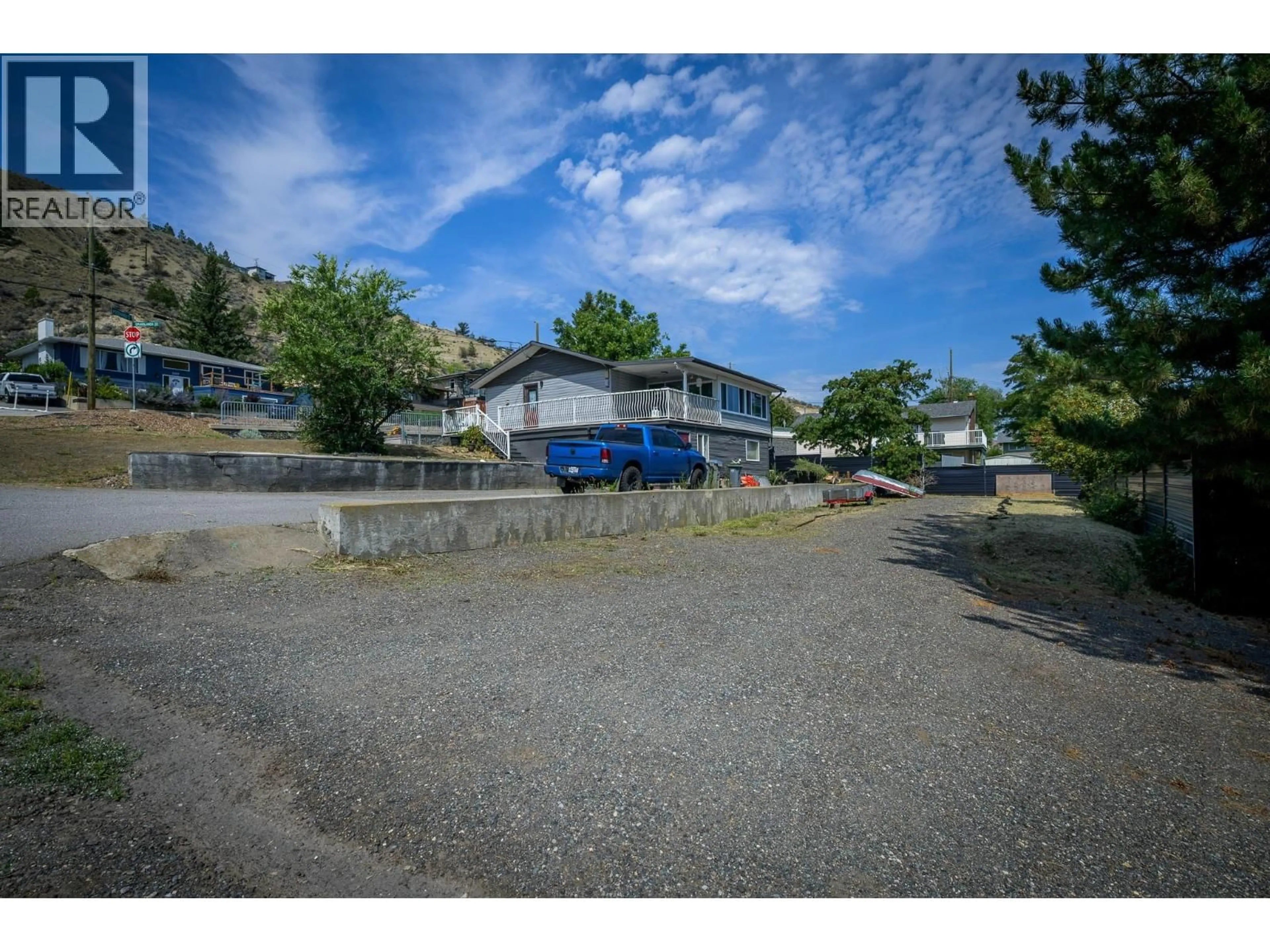 A pic from outside/outdoor area/front of a property/back of a property/a pic from drone, street for 880 WOODHAVEN DRIVE, Kamloops British Columbia V2B6E5