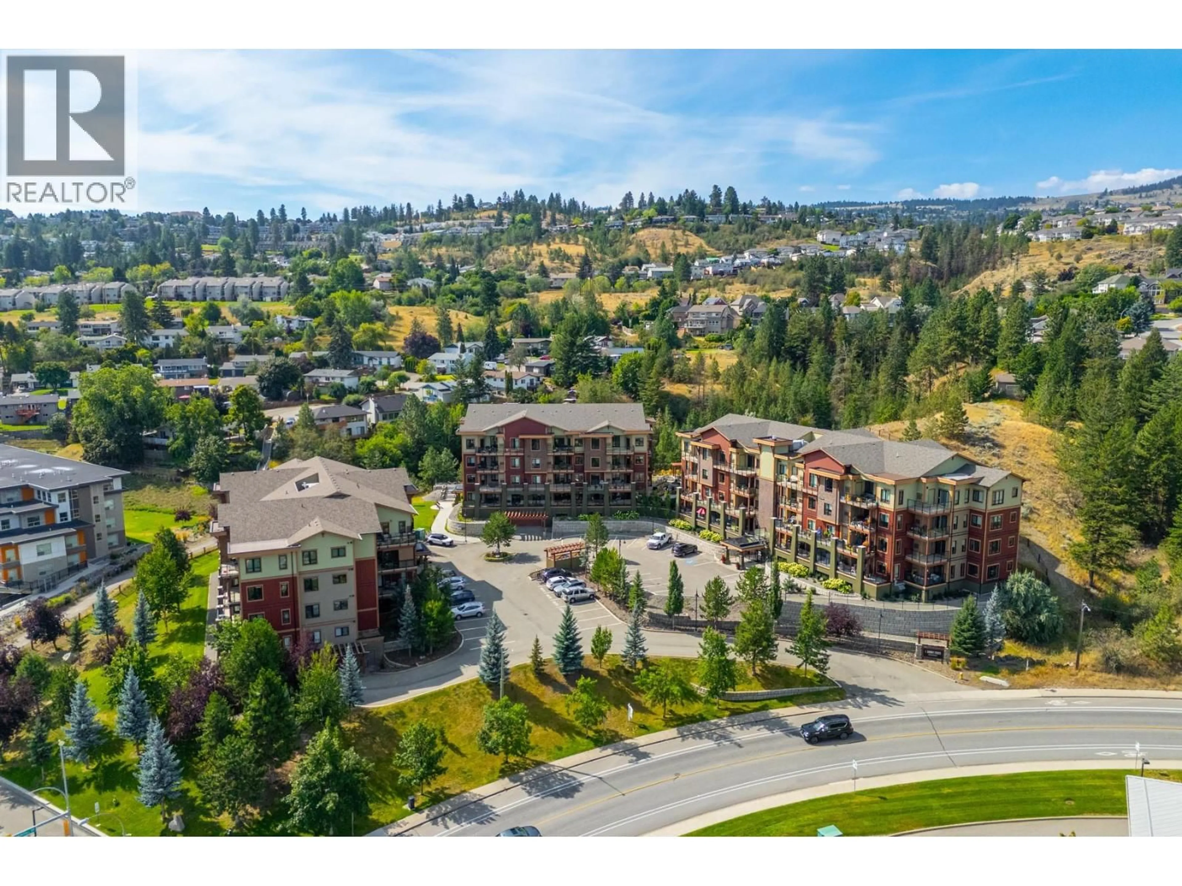 A pic from outside/outdoor area/front of a property/back of a property/a pic from drone, mountain view for 2401 - 1405 SPRINGHILL DRIVE, Kamloops British Columbia V2C0B4