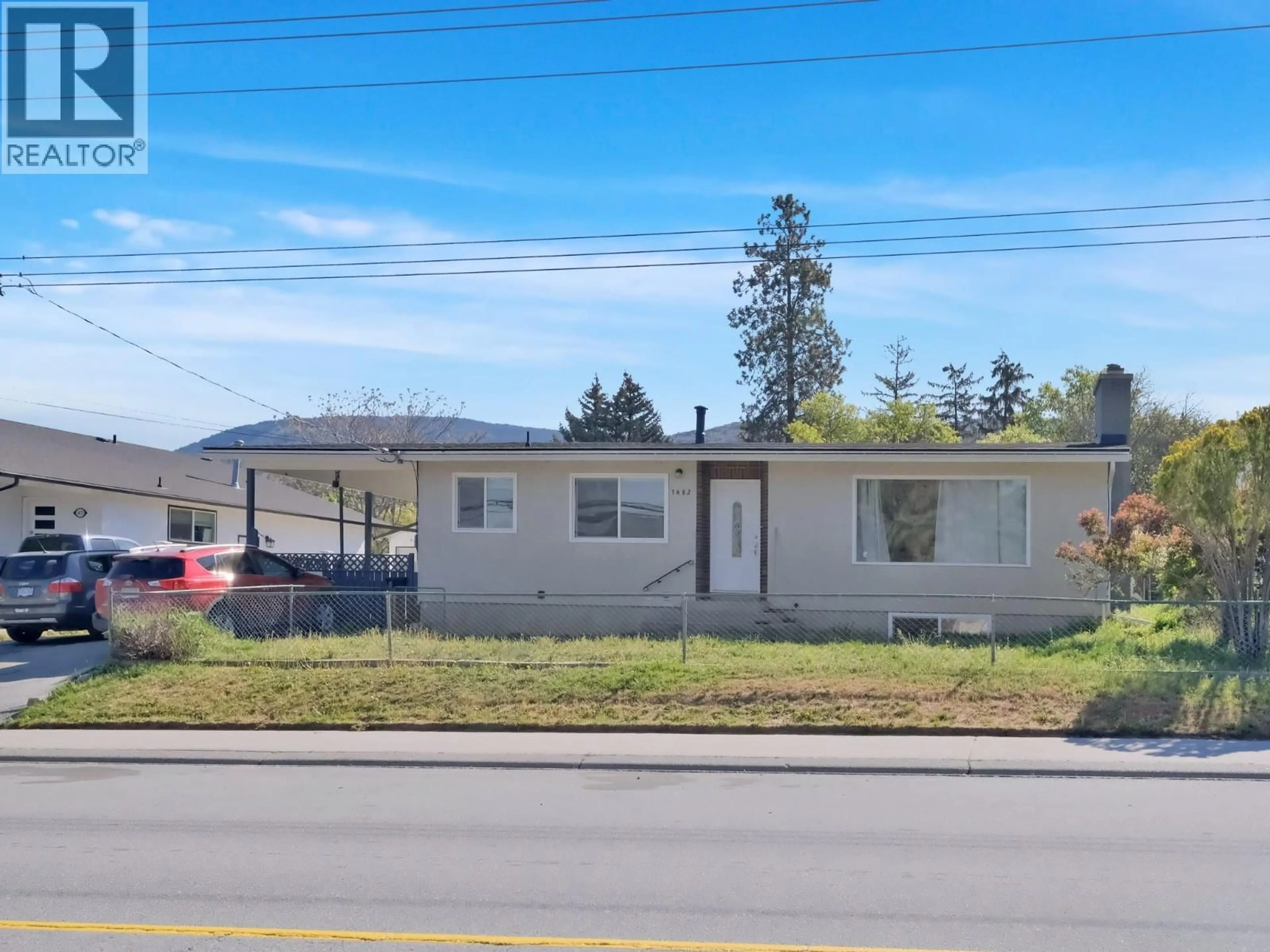 Home with vinyl exterior material, street for 1482 COLUMBIA STREET, Penticton British Columbia V2A3X8