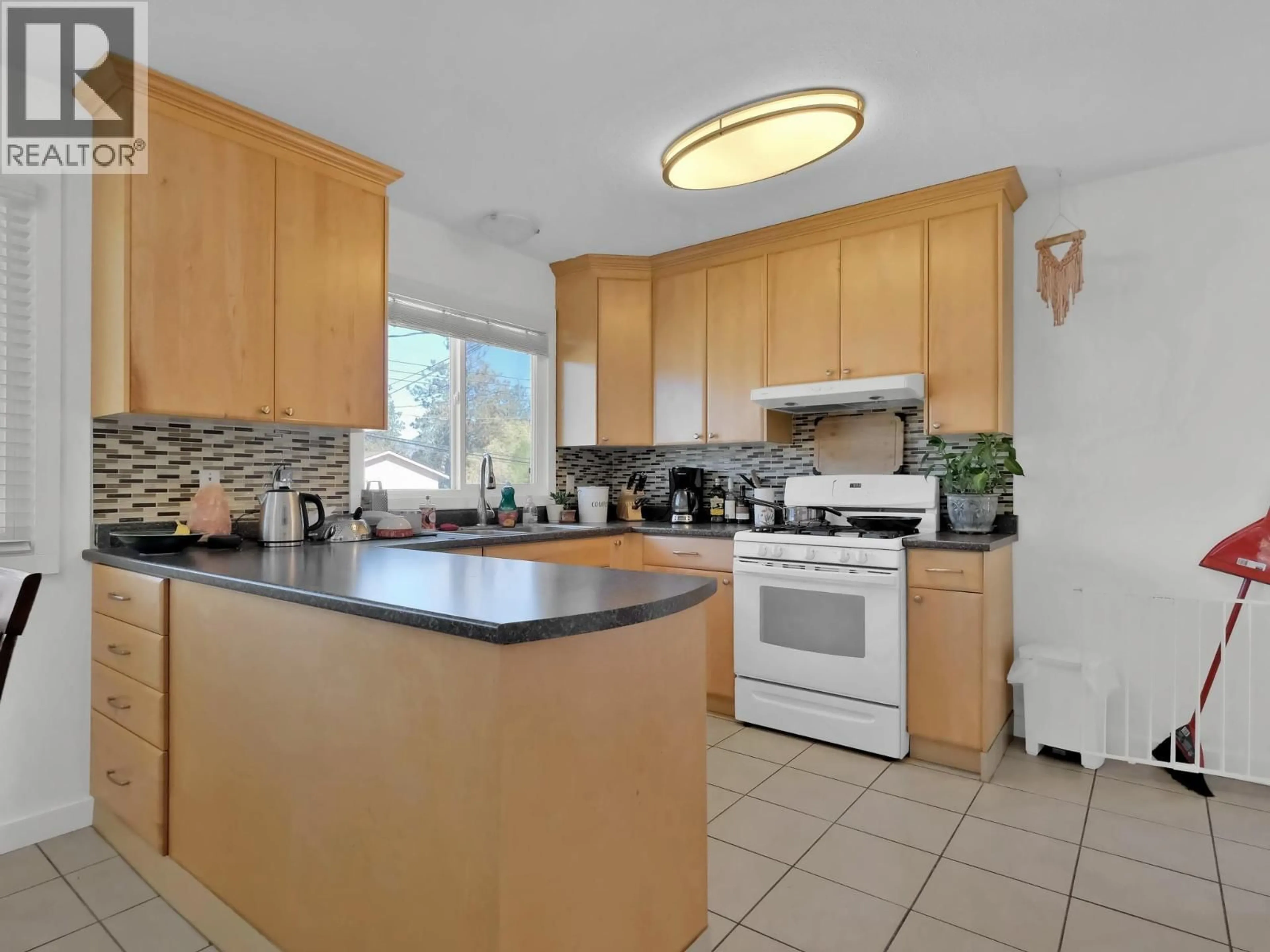Standard kitchen, ceramic/tile floor for 1482 COLUMBIA STREET, Penticton British Columbia V2A3X8
