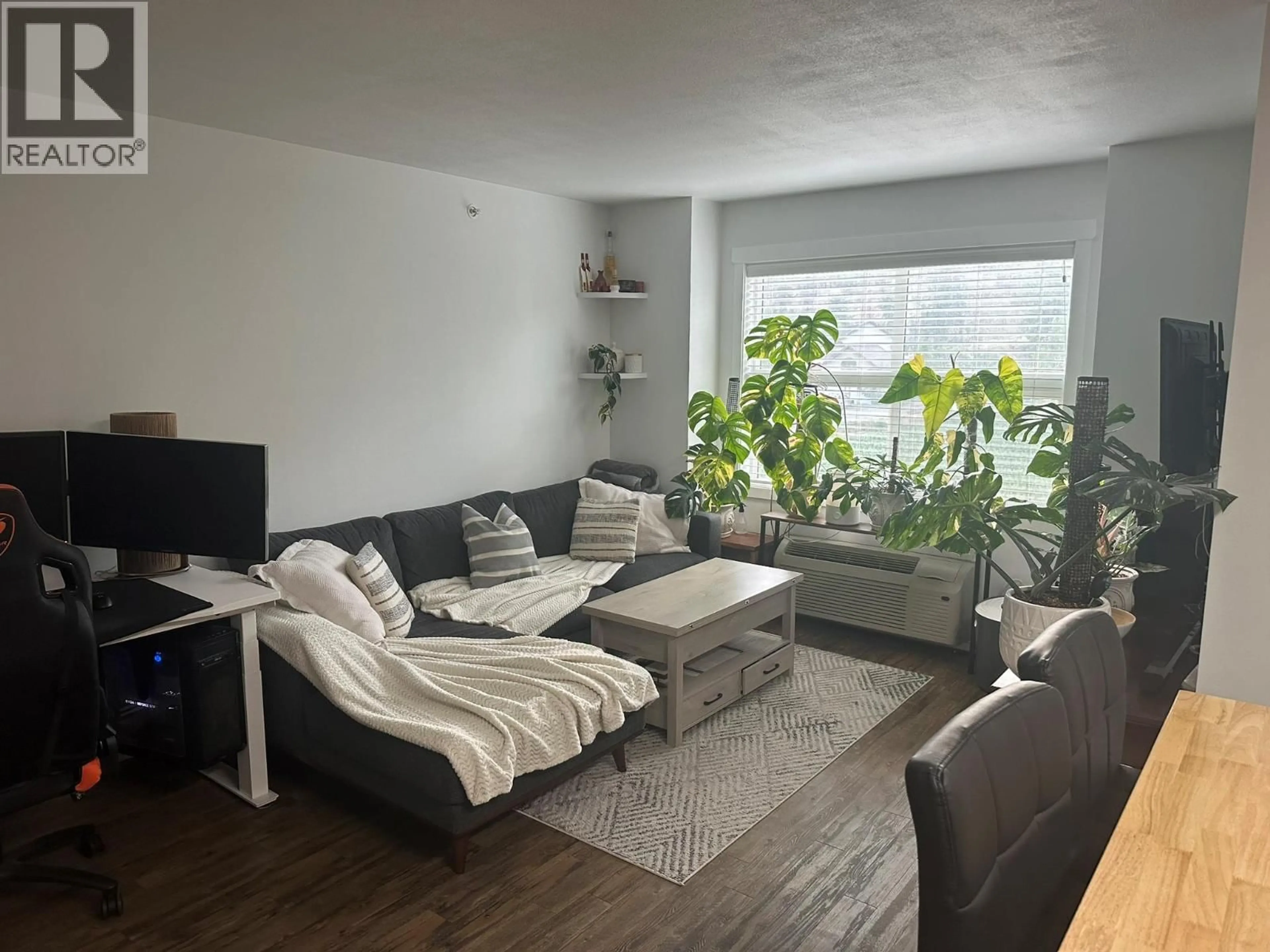 Living room with furniture, unknown for B-203 - 1477 GLENMORE ROAD NORTH, Kelowna British Columbia V1V2C5