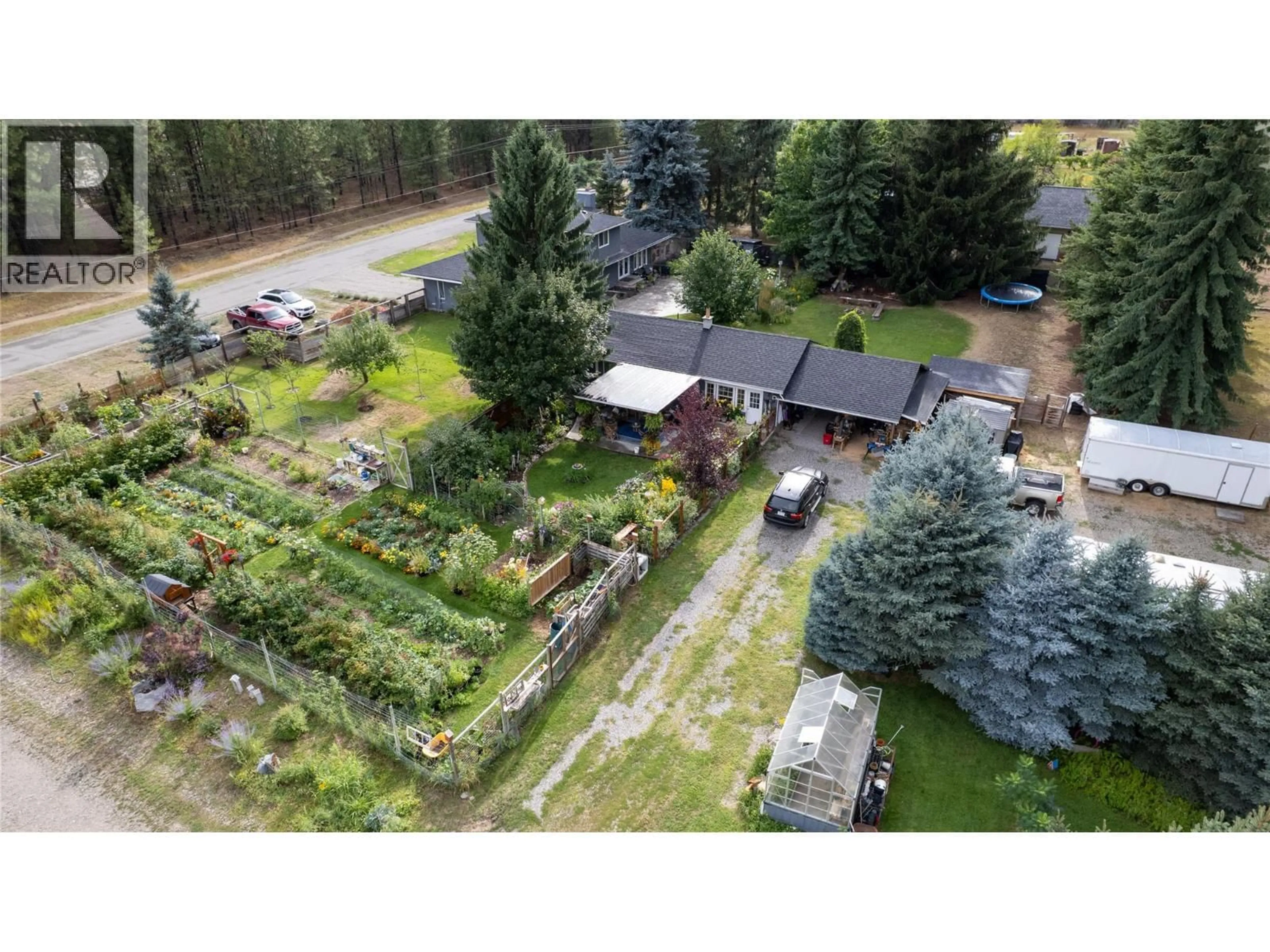 A pic from outside/outdoor area/front of a property/back of a property/a pic from drone, forest/trees view for 2065 COALCHUTE ROAD, Grand Forks British Columbia V0H1H2