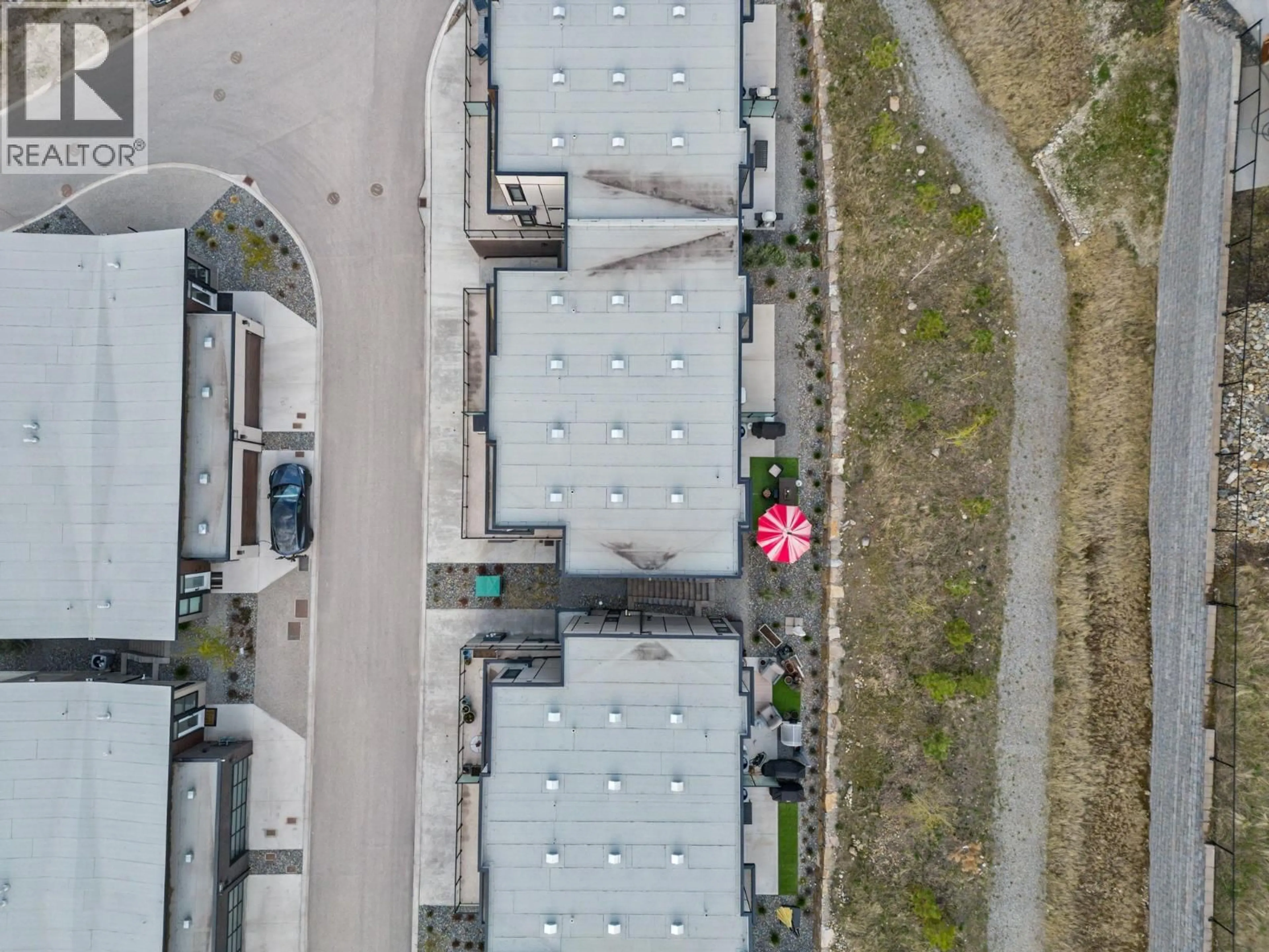 A pic from outside/outdoor area/front of a property/back of a property/a pic from drone, street for 7 - 3220 HILLTOWN DRIVE, Kelowna British Columbia V1V0C6