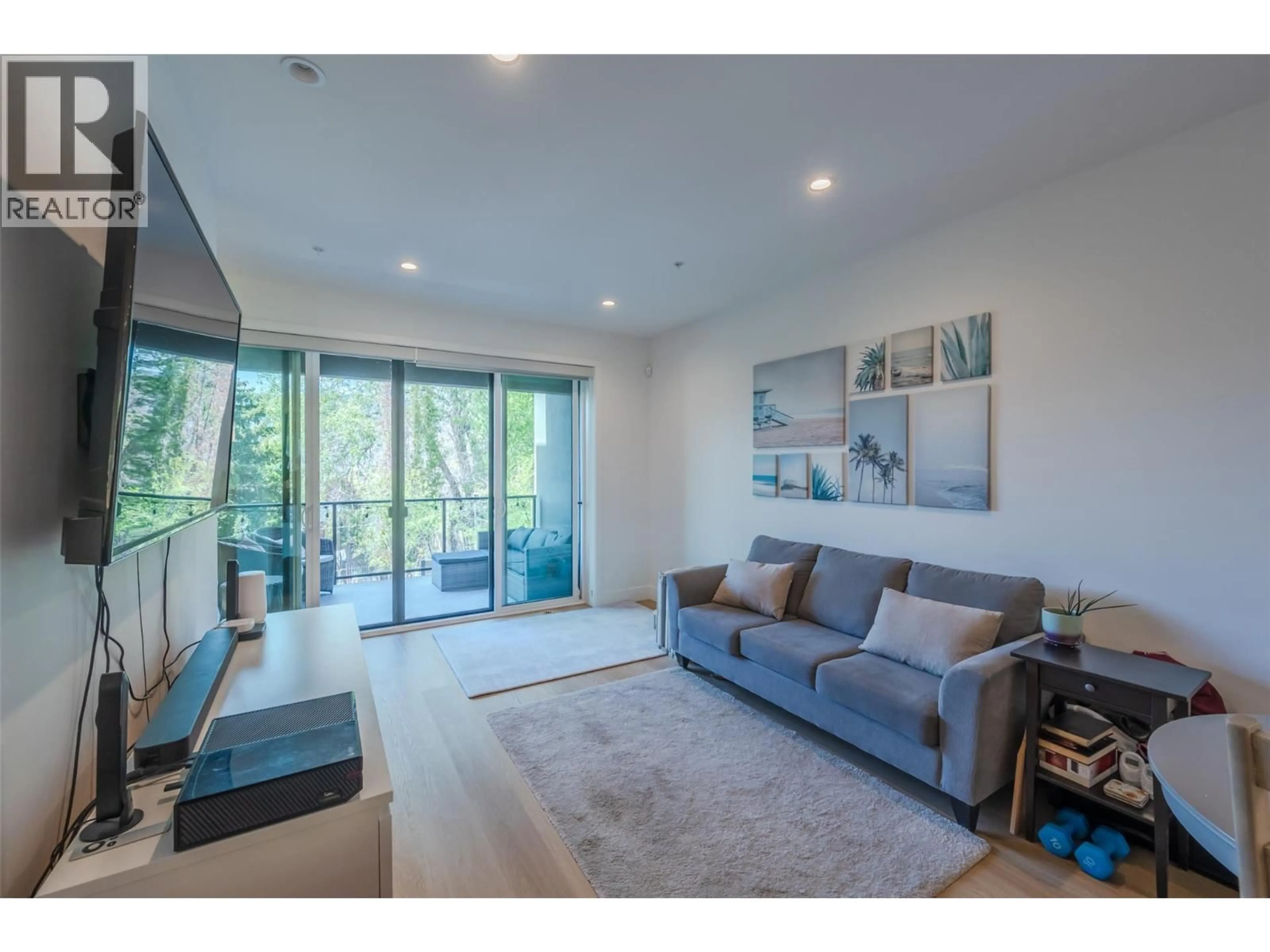 Living room with furniture, unknown for 107 - 555 WADE AVENUE EAST, Penticton British Columbia V2A1T3