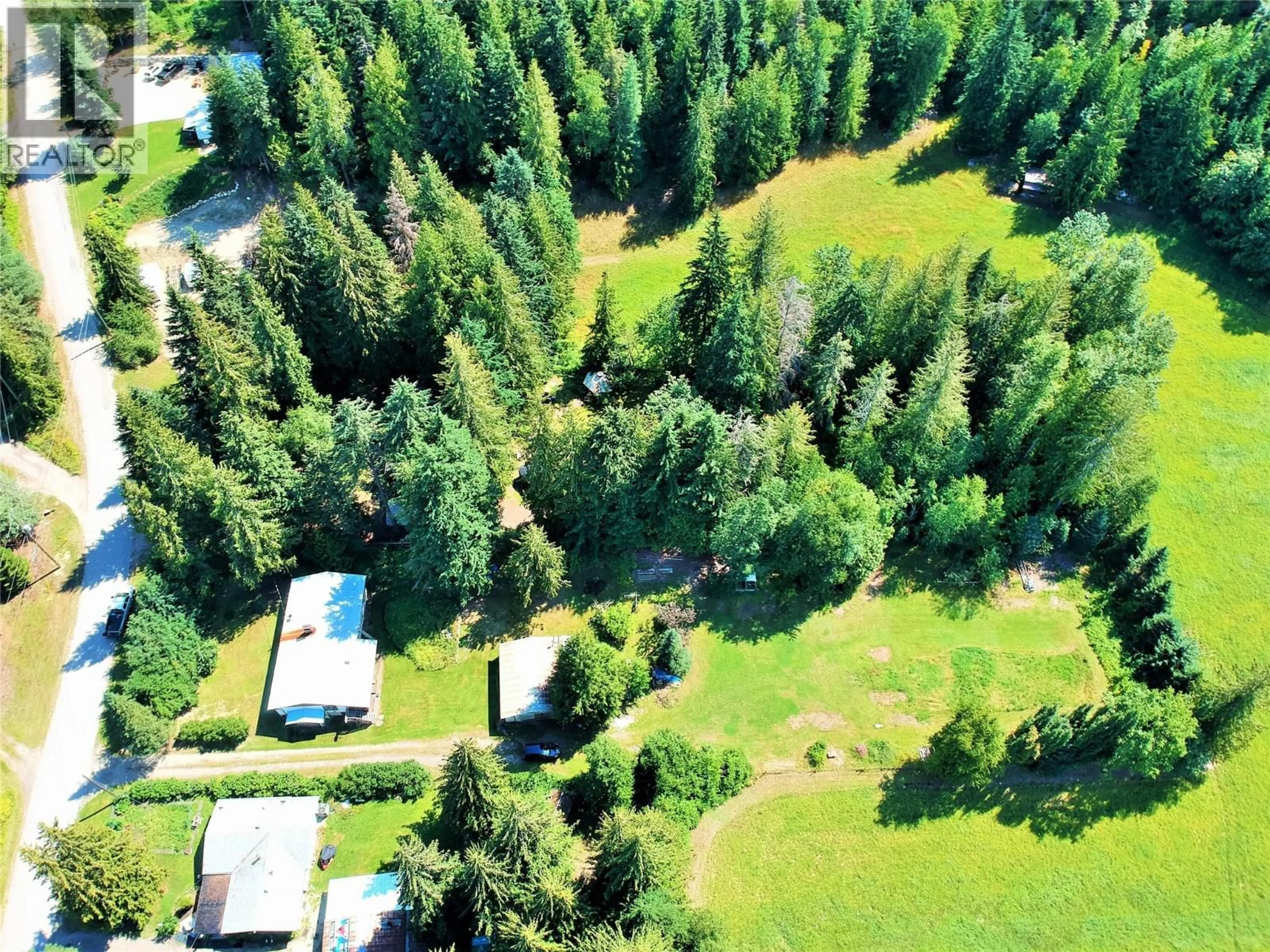 A pic from outside/outdoor area/front of a property/back of a property/a pic from drone, forest/trees view for 1825 STEPP PIT ROAD, Sicamous British Columbia V0E2V1