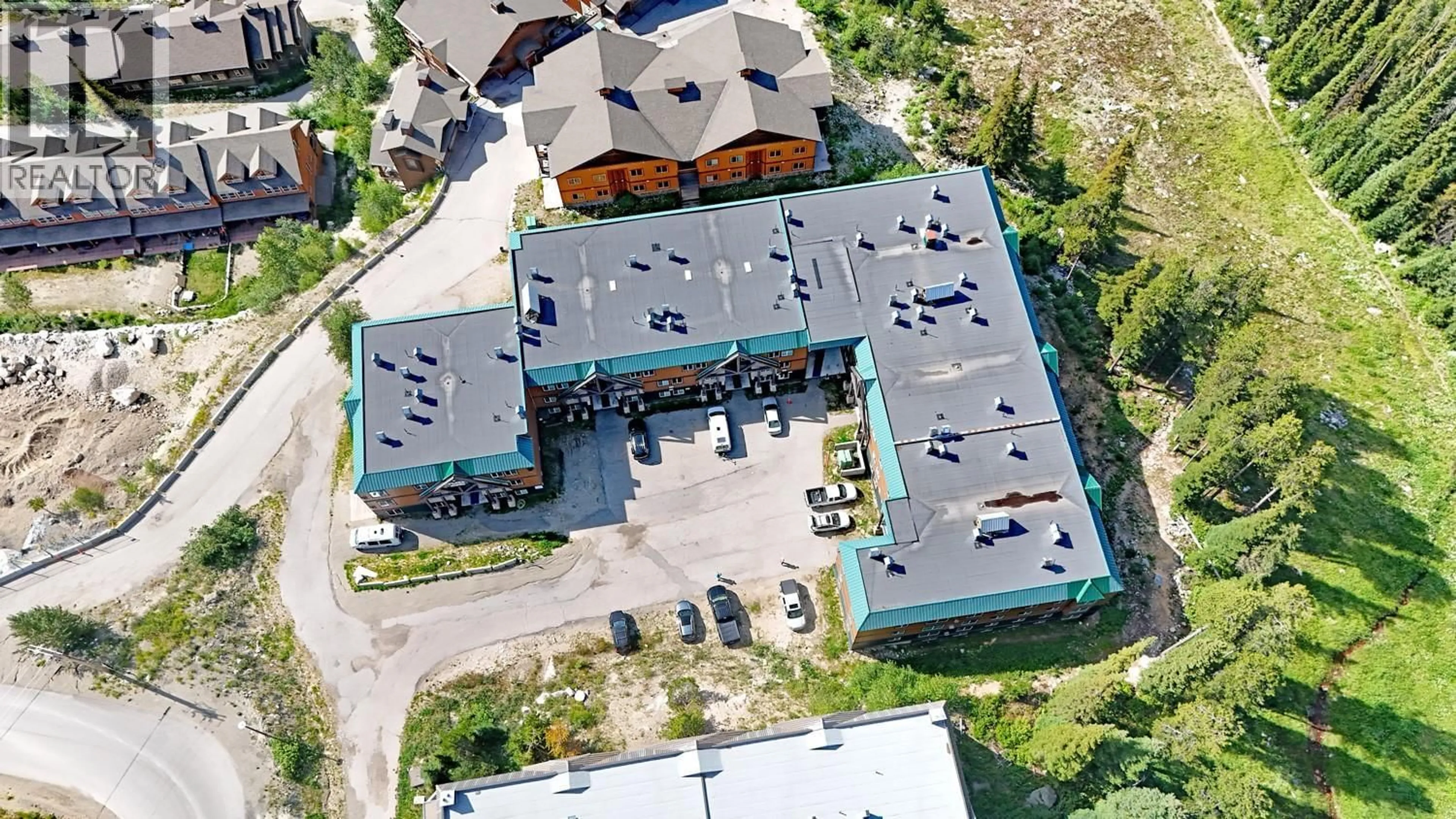A pic from outside/outdoor area/front of a property/back of a property/a pic from drone, building for 328 - 40 KETTLE VIEW ROAD, Big White British Columbia V1P1T4