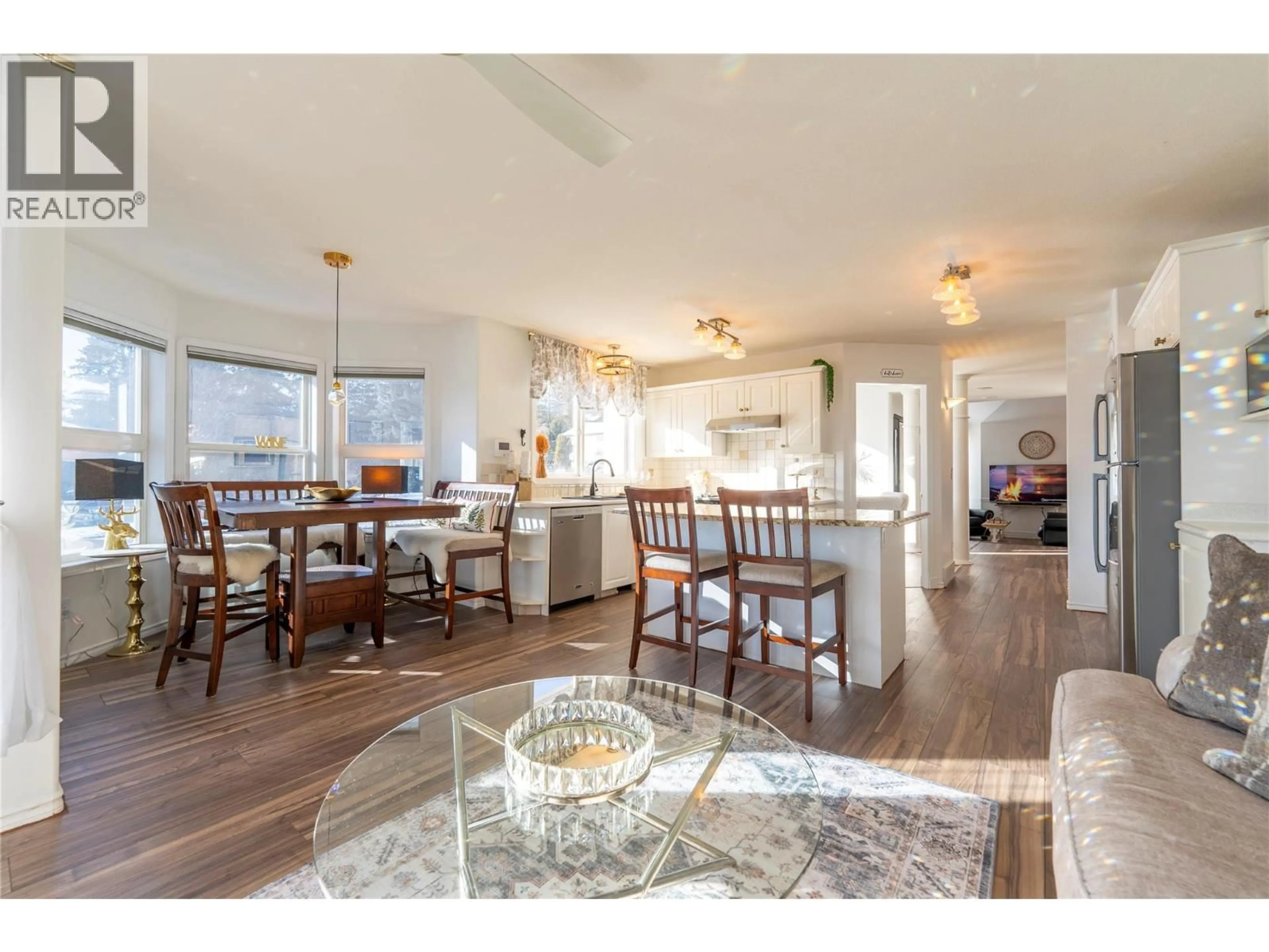 Open concept kitchen, wood/laminate floor for 2669 WILD HORSE DRIVE, West Kelowna British Columbia V4T2K8