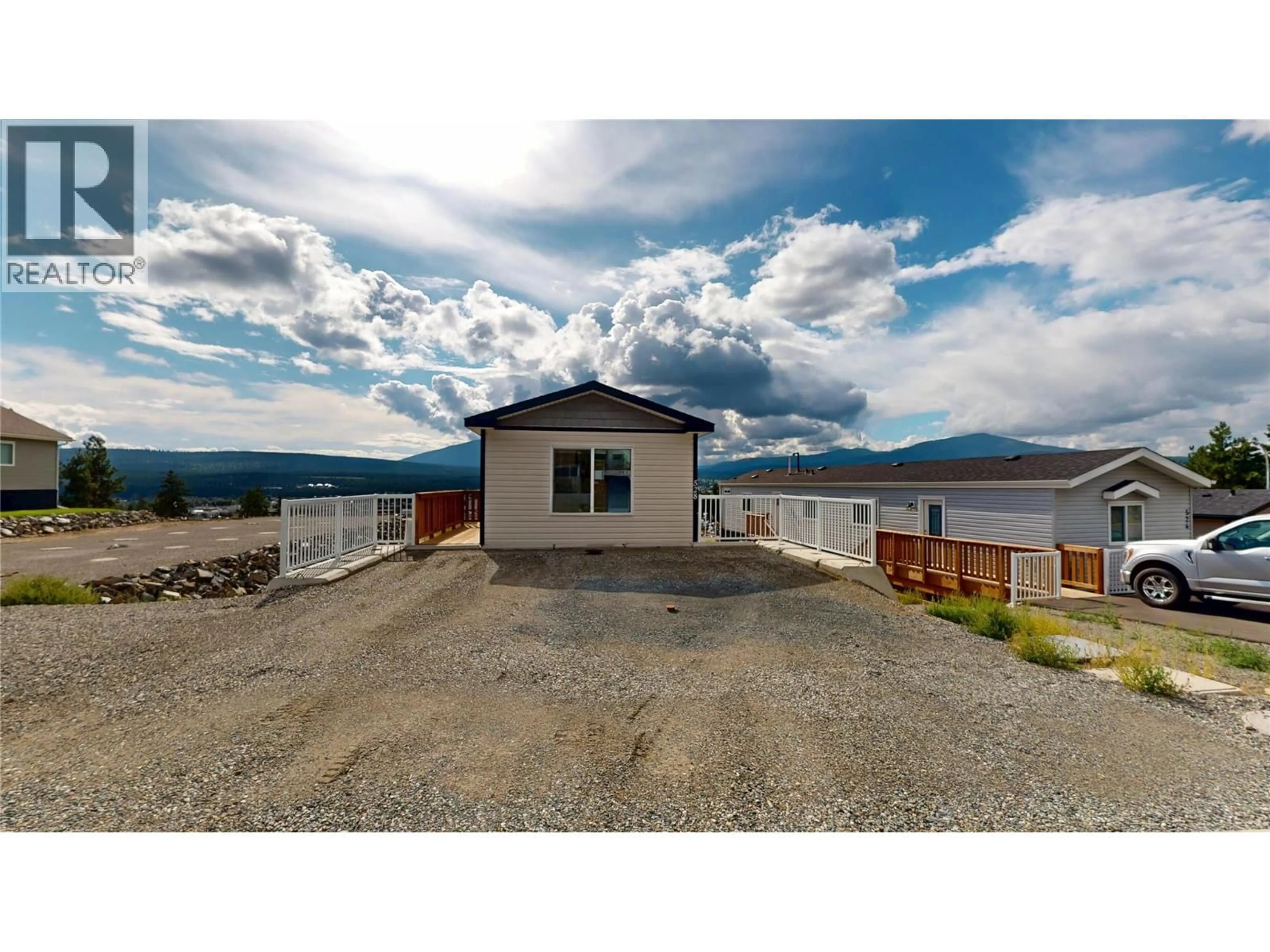A pic from outside/outdoor area/front of a property/back of a property/a pic from drone, water/lake/river/ocean view for 528 STEEPLEVIEW AVENUE NORTHWEST, Cranbrook British Columbia V1C5L3