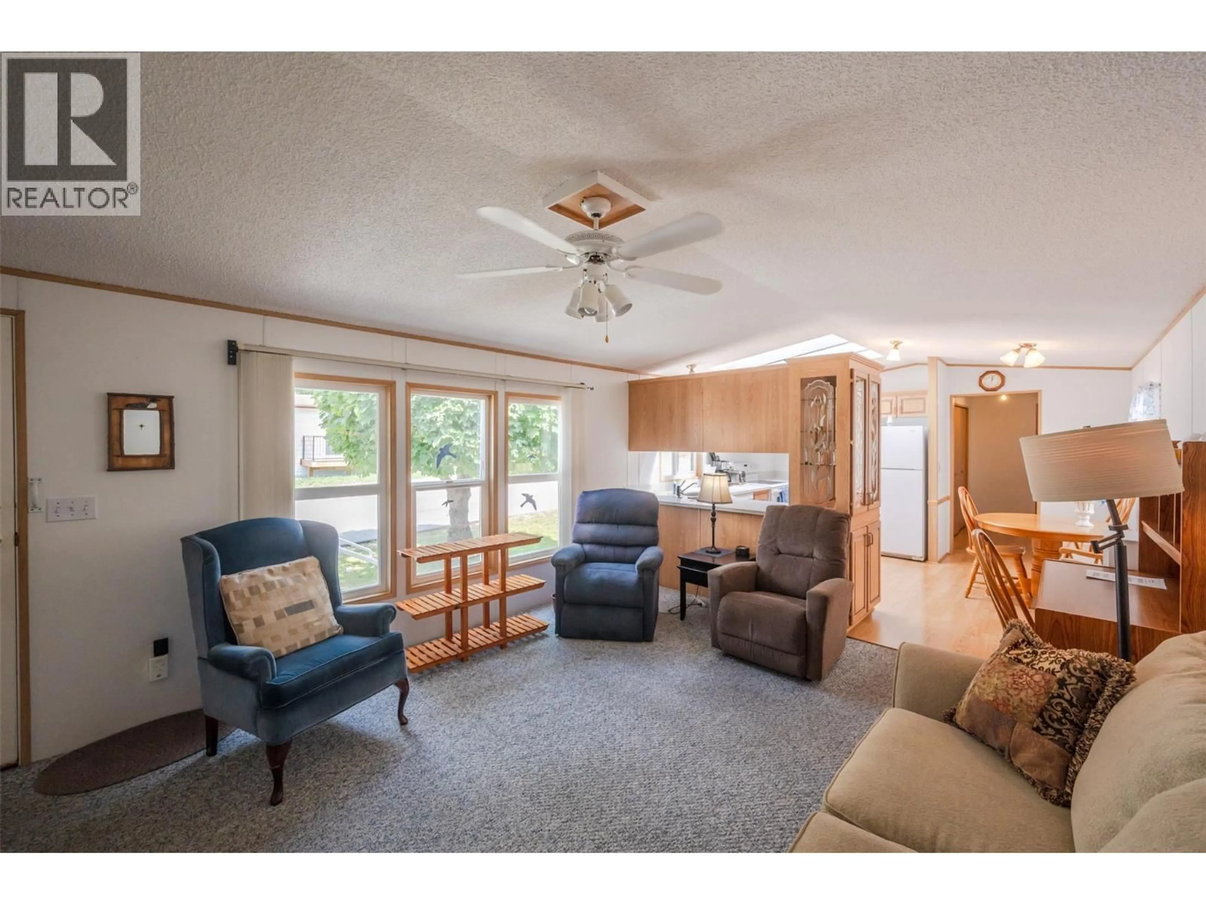 Living room with furniture, unknown for F22 - 4505 MCLEAN CREEK ROAD, Okanagan Falls British Columbia V0H1R1