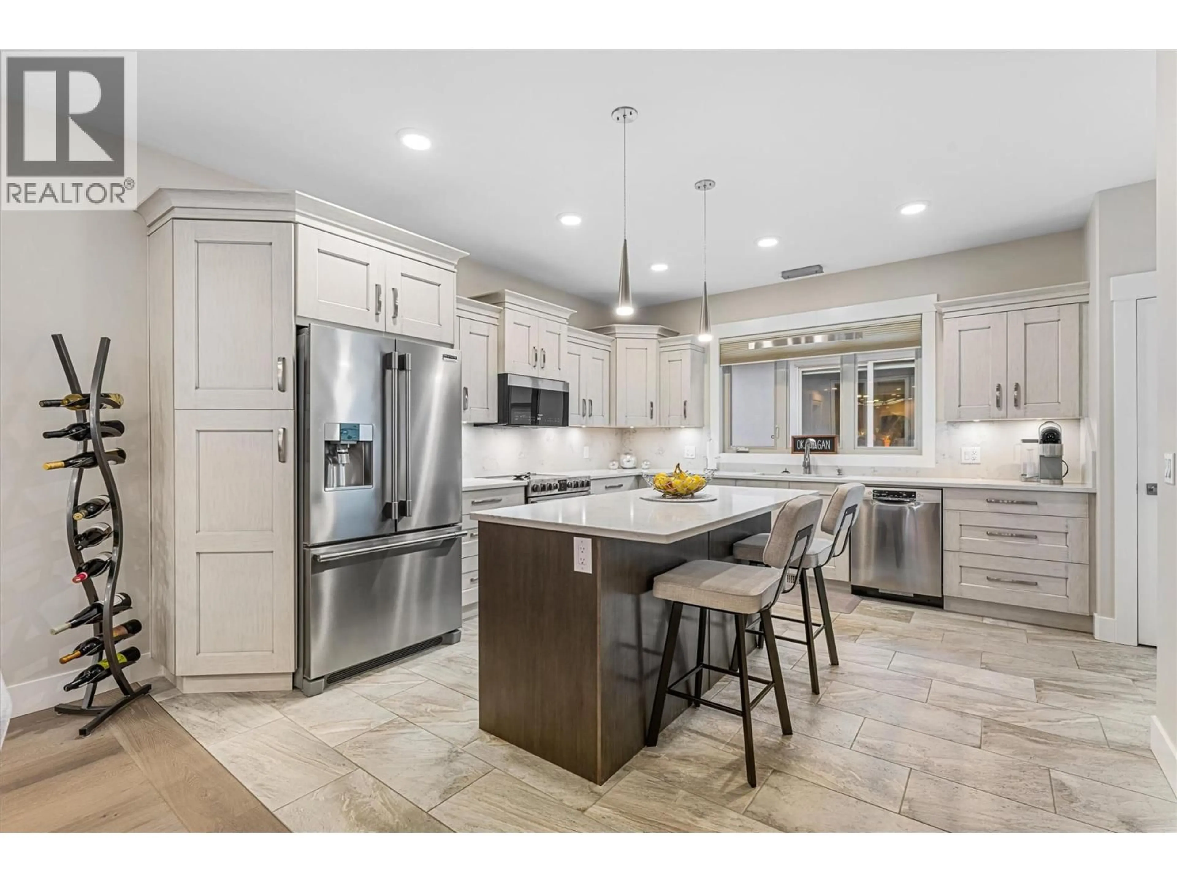 Open concept kitchen, ceramic/tile floor for 3081 BURTCH ROAD, Kelowna British Columbia V1W5M9