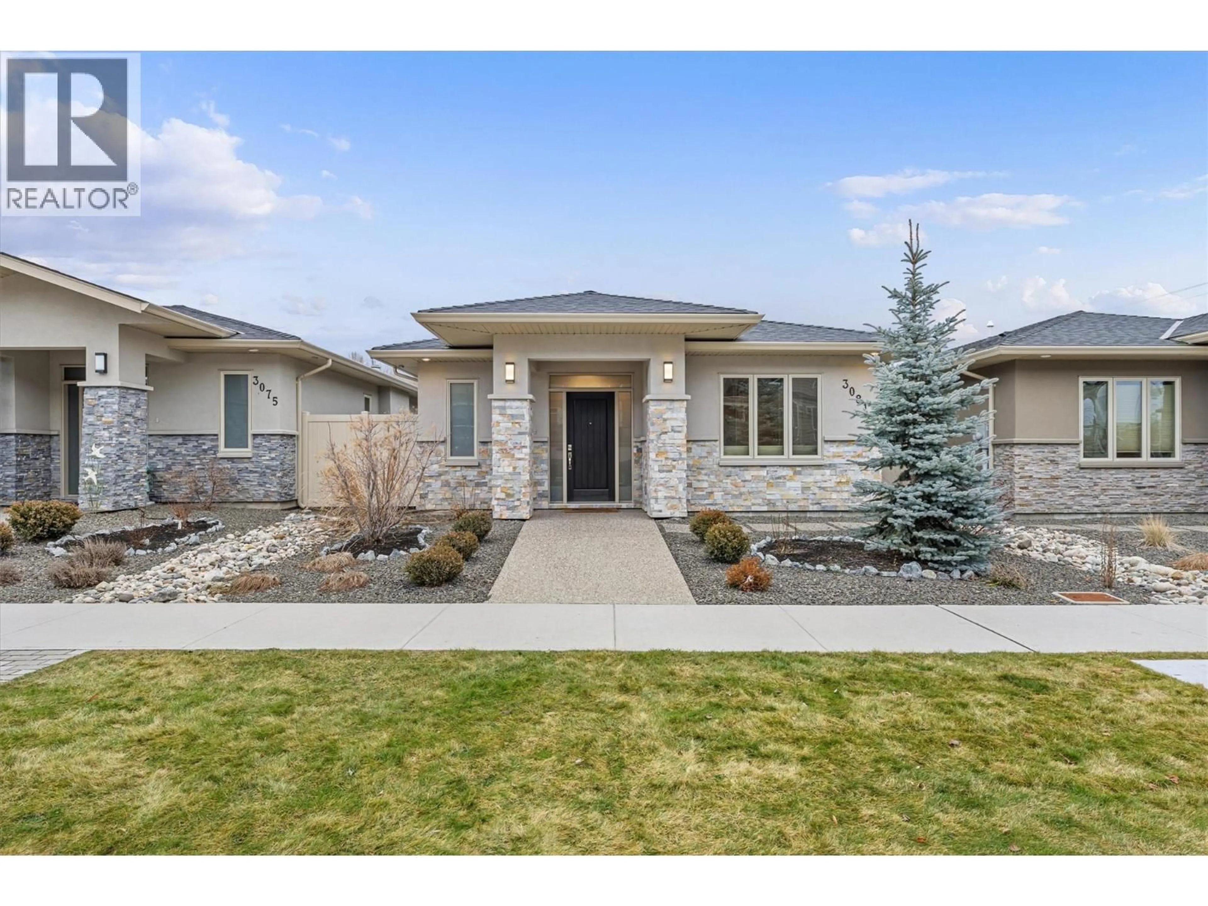 Home with brick exterior material, street for 3081 BURTCH ROAD, Kelowna British Columbia V1W5M9