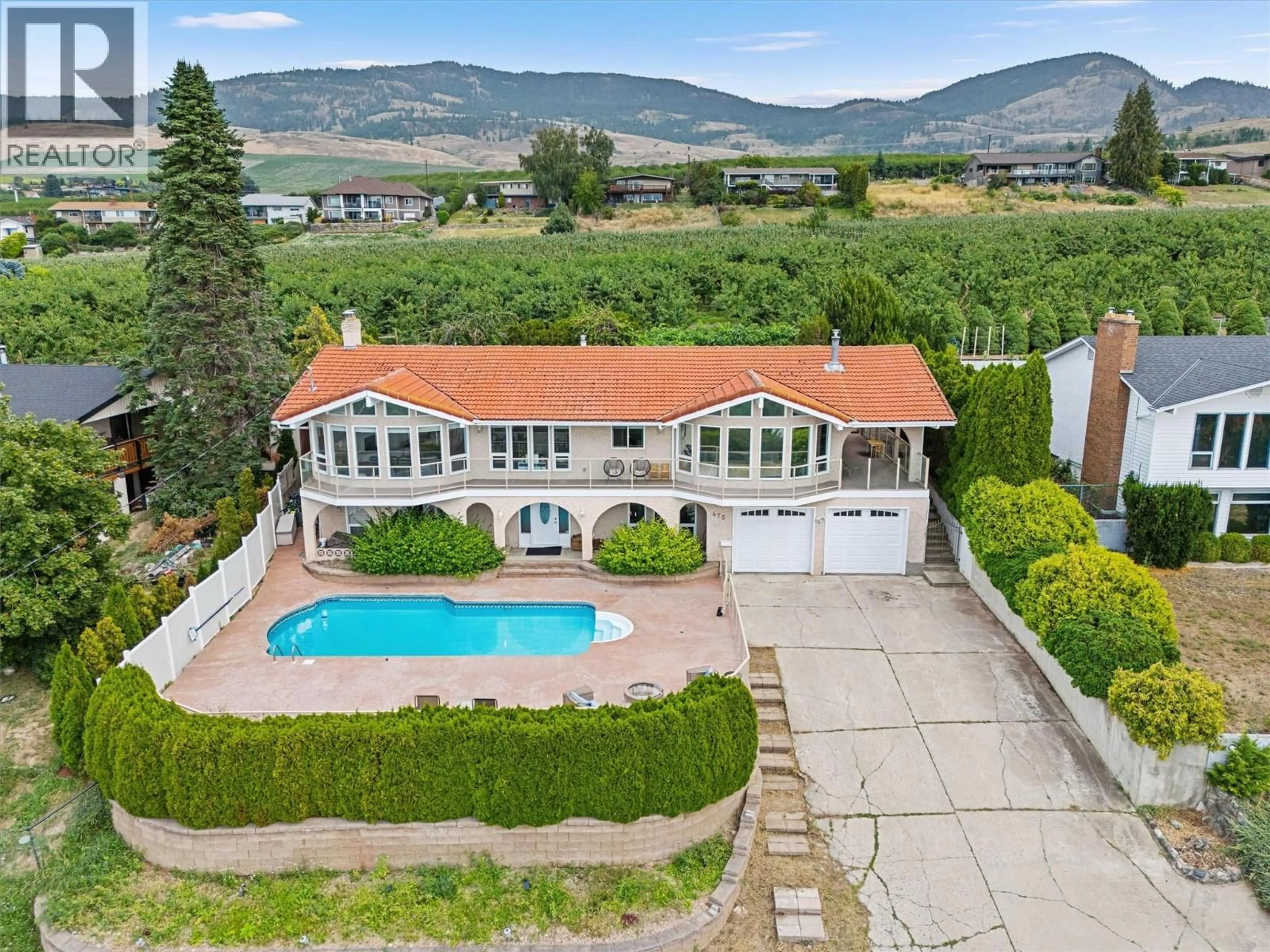A pic from outside/outdoor area/front of a property/back of a property/a pic from drone, mountain view for 475 EL CARLO ROAD, Kelowna British Columbia V1X2R5