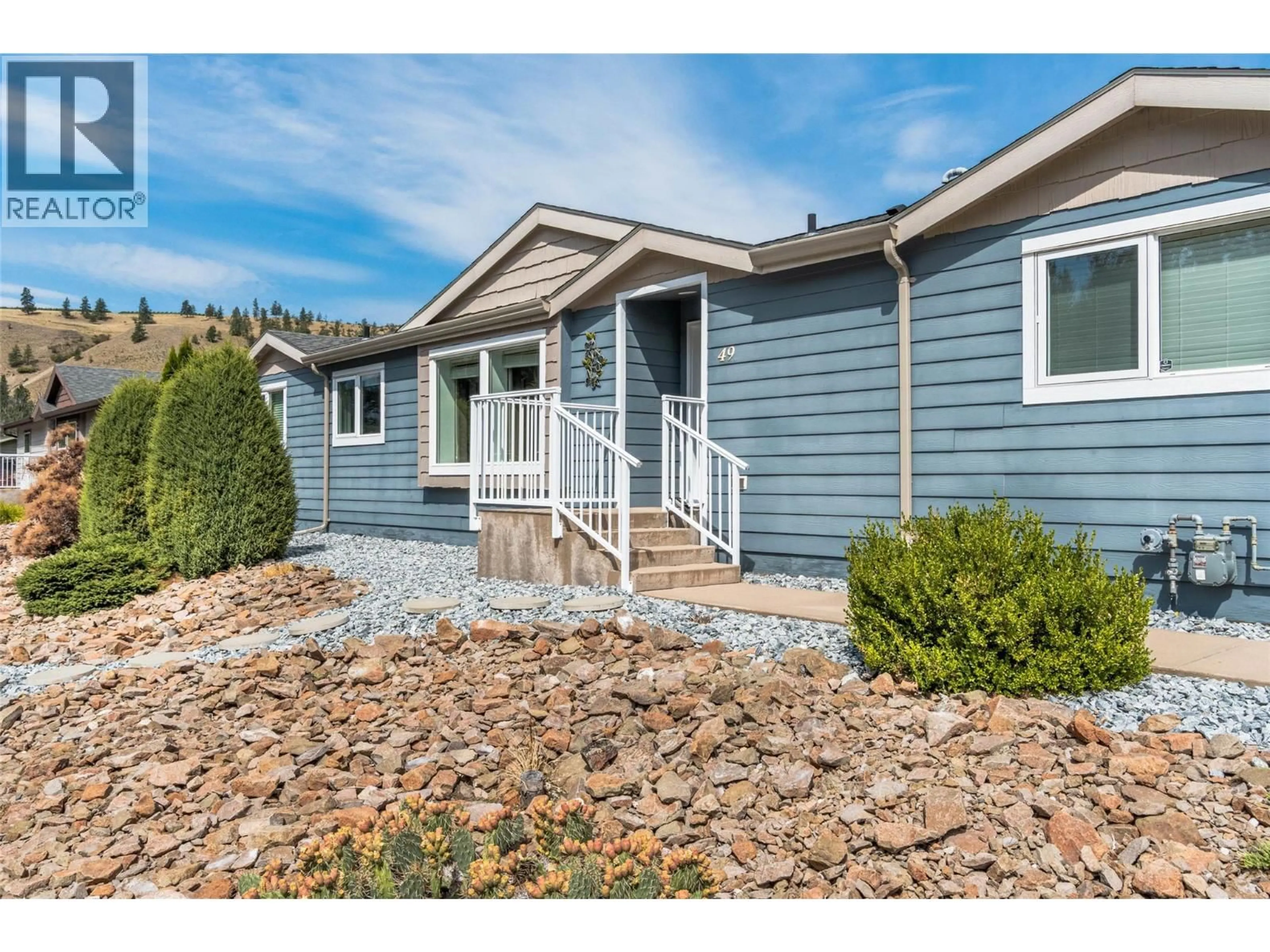 Home with vinyl exterior material, street for 49 - 8300 GALLAGHER LAKE FRONTAGE ROAD, Oliver British Columbia V0H1T2