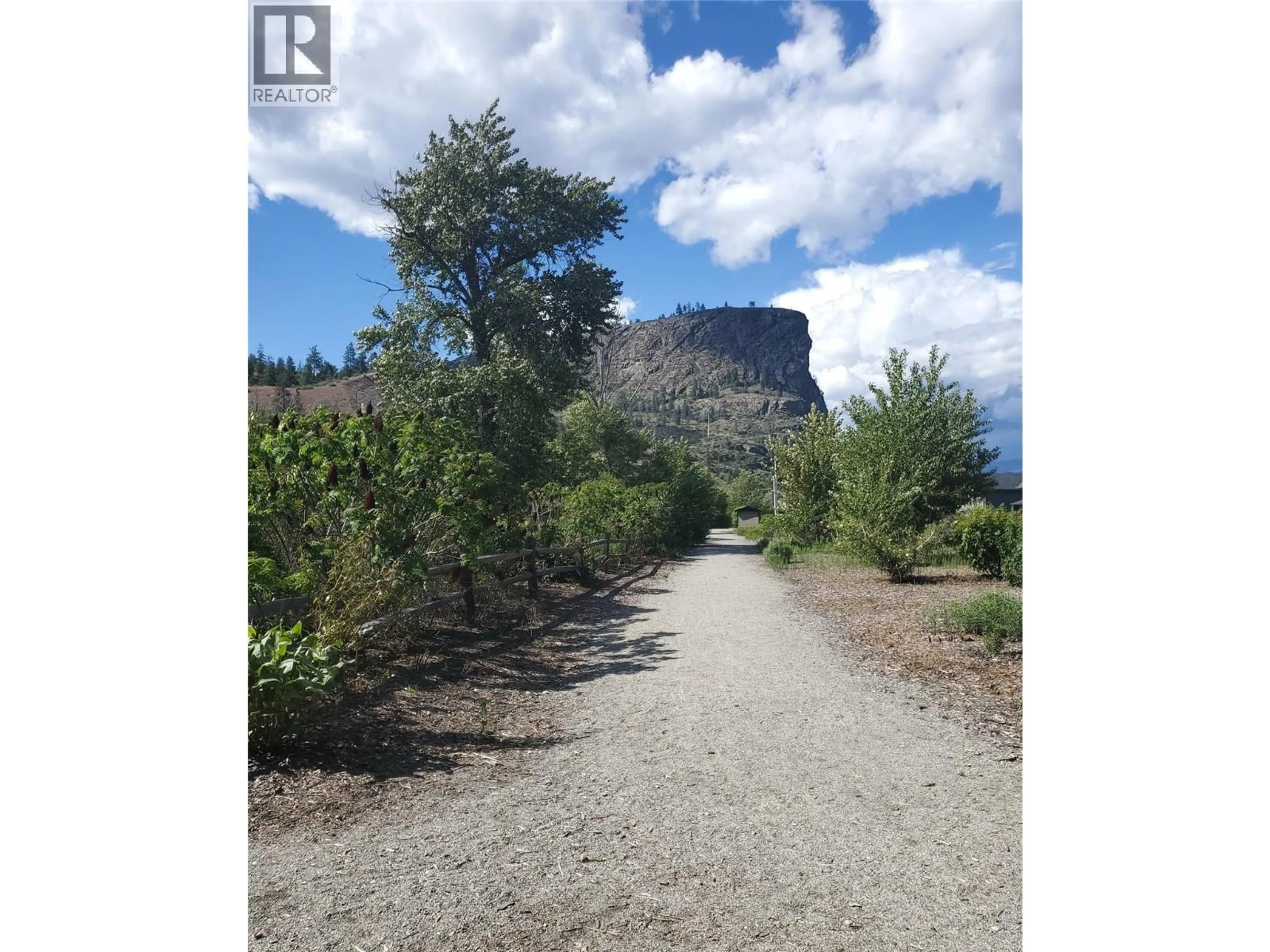 A pic from outside/outdoor area/front of a property/back of a property/a pic from drone, forest/trees view for 49 - 8300 GALLAGHER LAKE FRONTAGE ROAD, Oliver British Columbia V0H1T2
