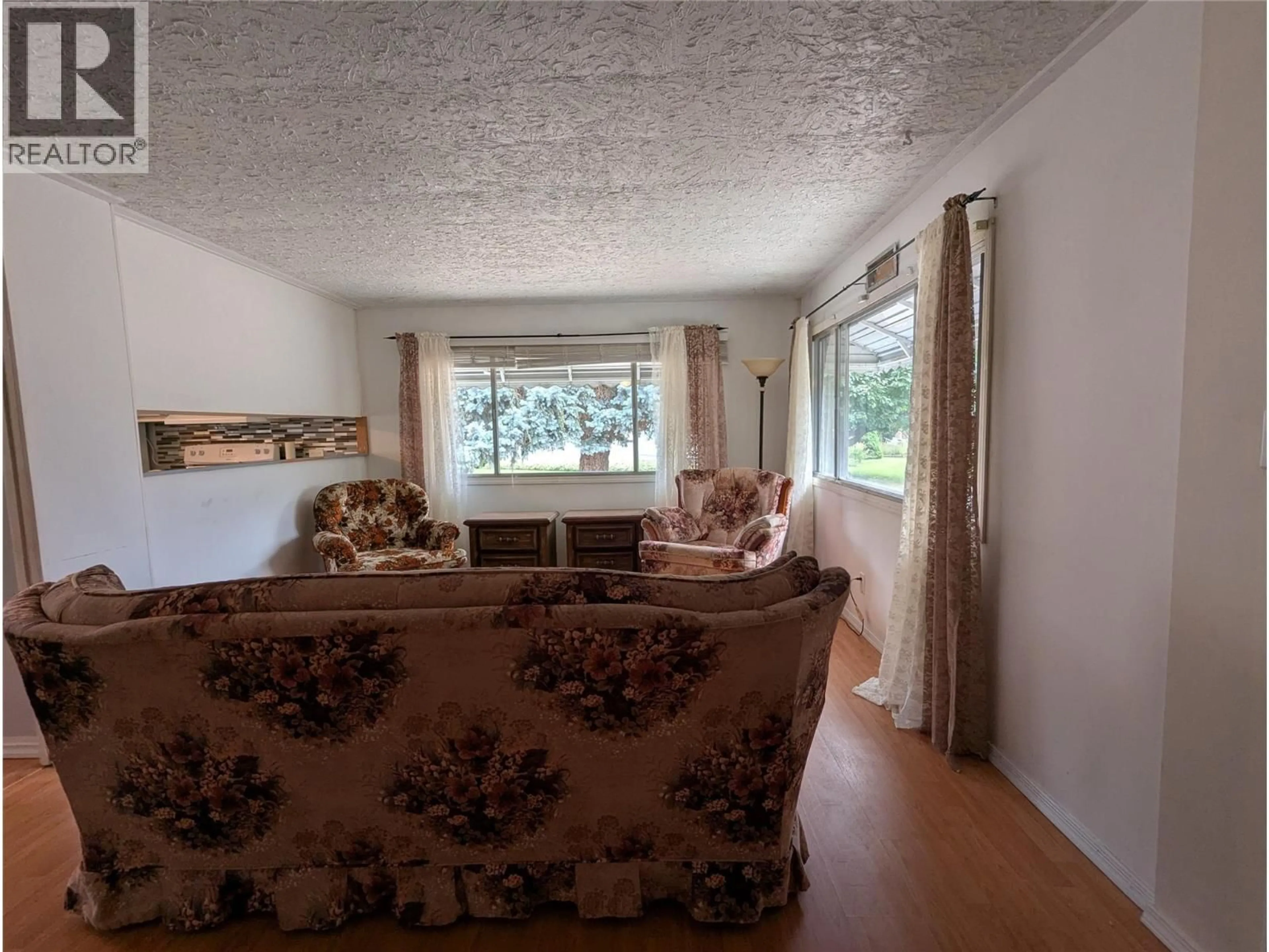 Living room with furniture, unknown for 40 - 3535 CASORSO ROAD, Kelowna British Columbia V1W3E1