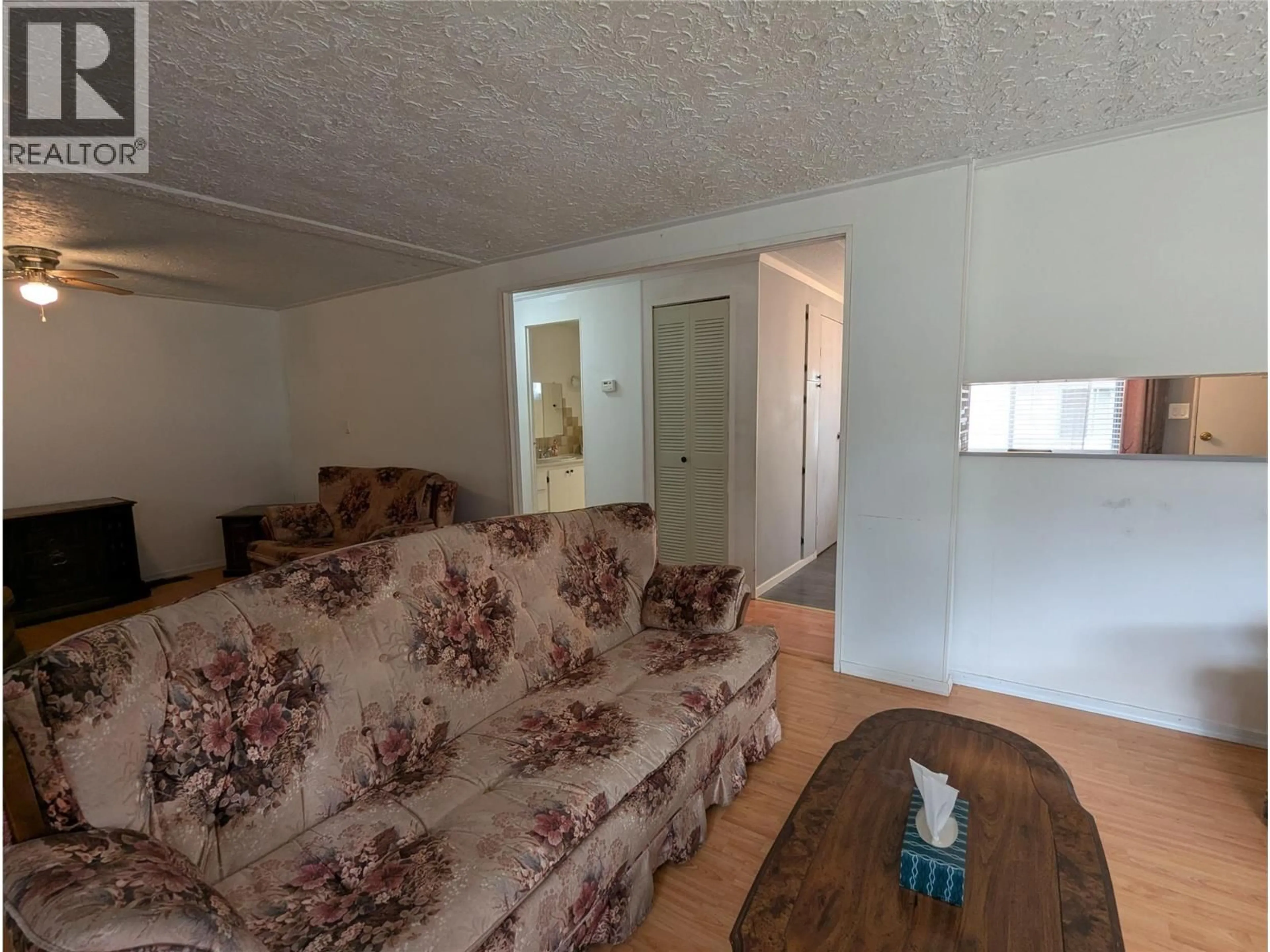 Living room with furniture, unknown for 40 - 3535 CASORSO ROAD, Kelowna British Columbia V1W3E1