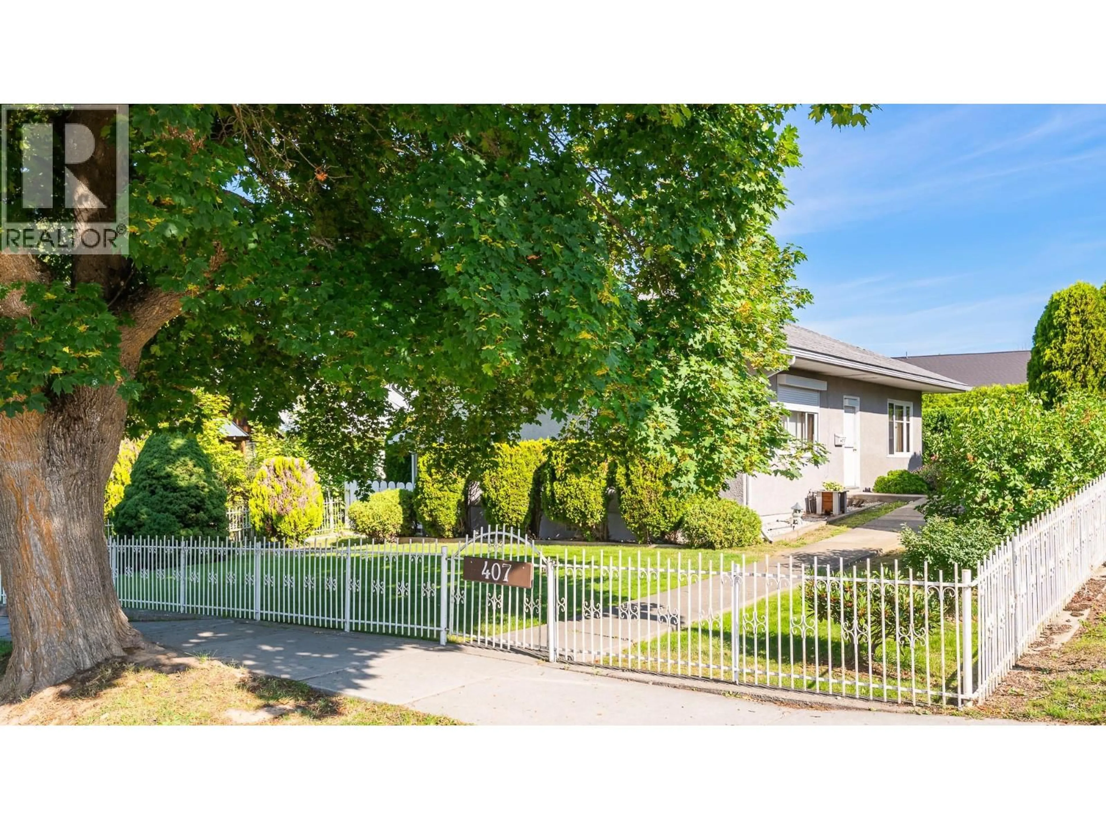 A pic from outside/outdoor area/front of a property/back of a property/a pic from drone, street for 407 10TH AVENUE NORTH, Creston British Columbia V0B1G4