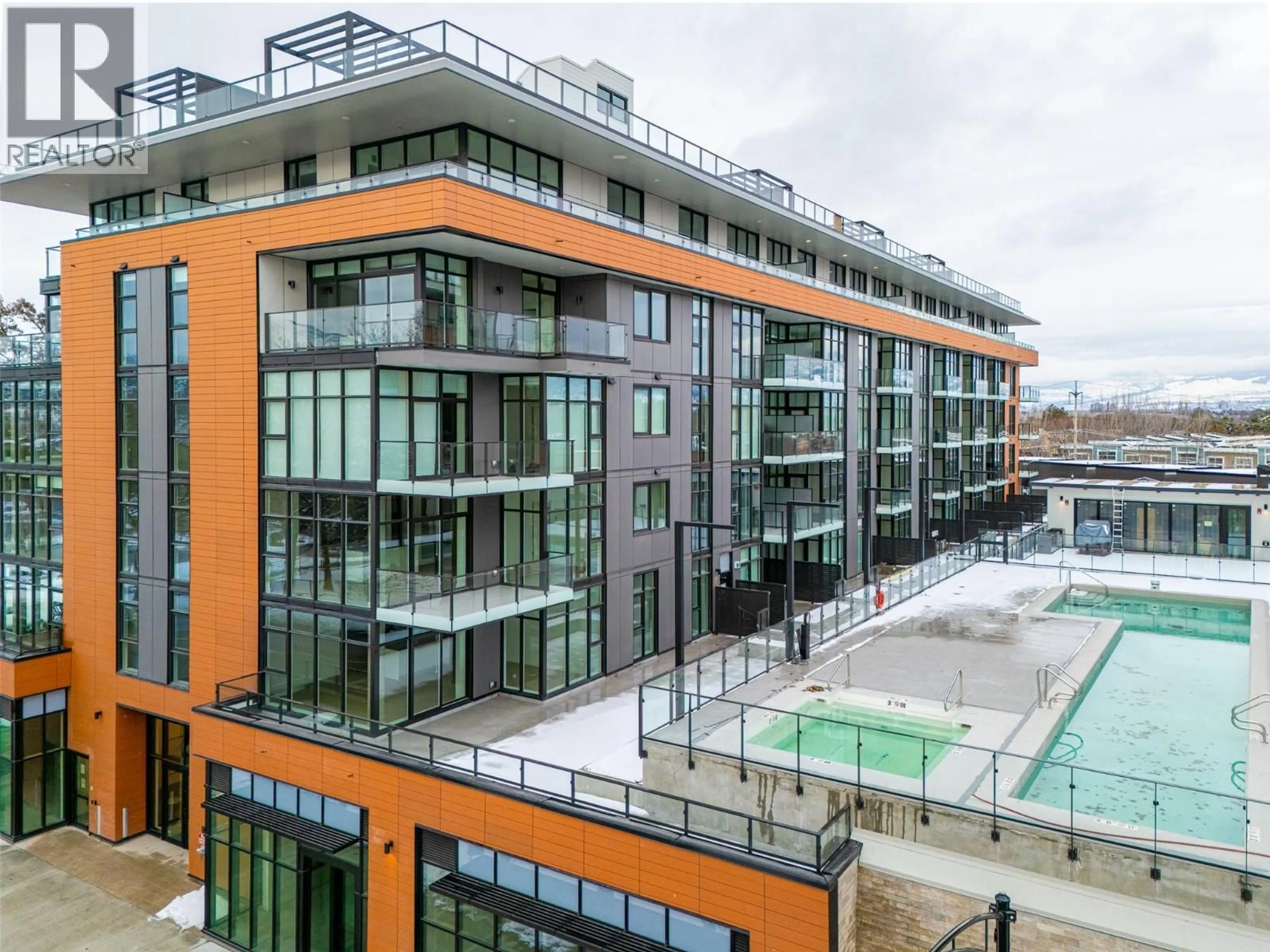A pic from outside/outdoor area/front of a property/back of a property/a pic from drone, city buildings view from balcony for 312 - 3389 LAKESHORE ROAD, Kelowna British Columbia V1W0G5