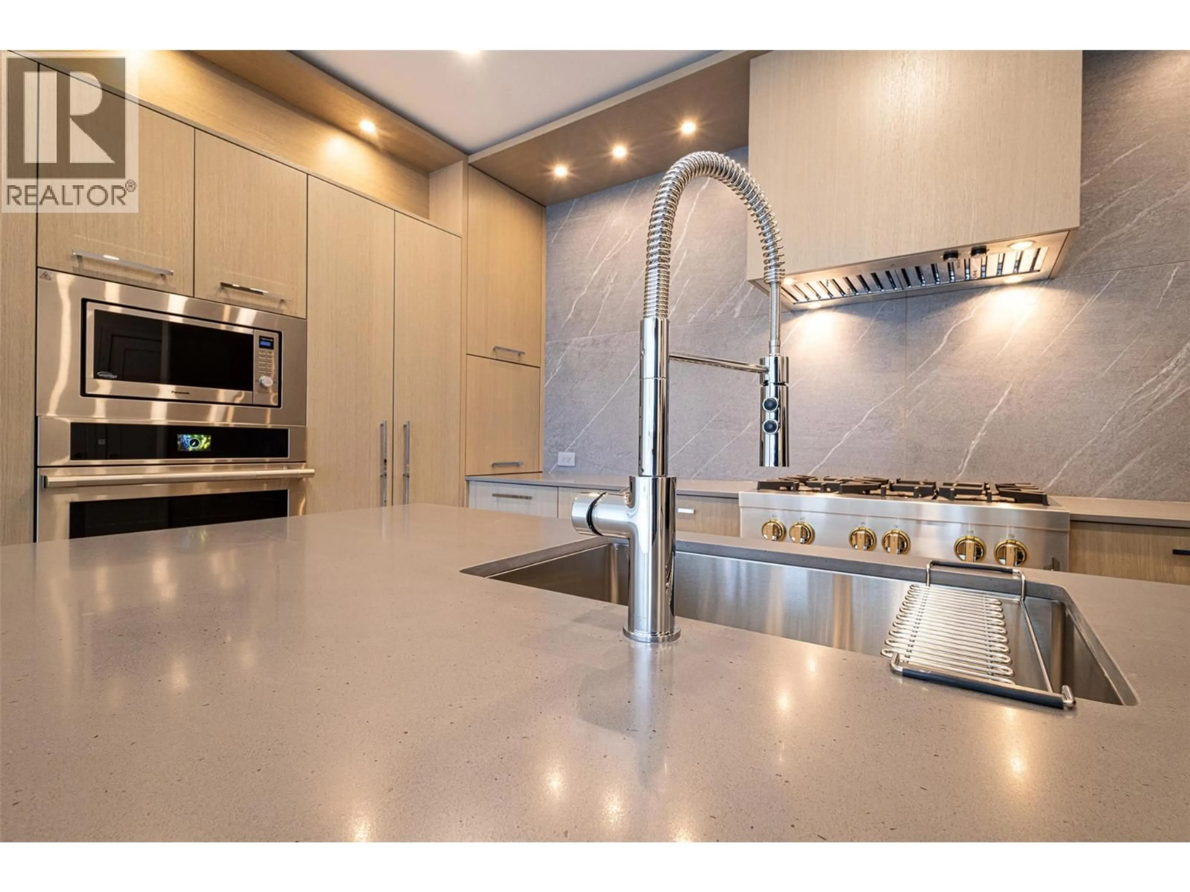 Contemporary kitchen, ceramic/tile floor for 312 - 3389 LAKESHORE ROAD, Kelowna British Columbia V1W0G5