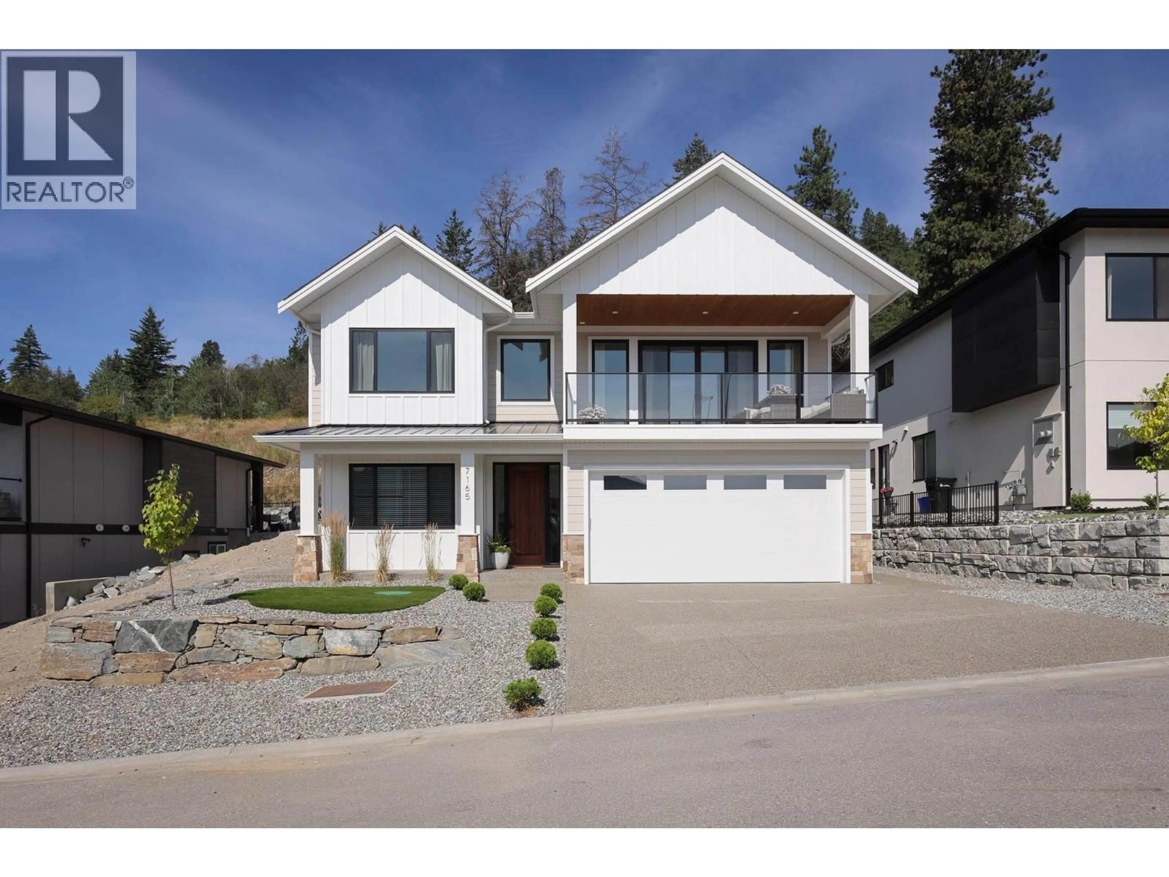Home with vinyl exterior material, street for 7165 NAKISKA DRIVE, Vernon British Columbia V1B3M5