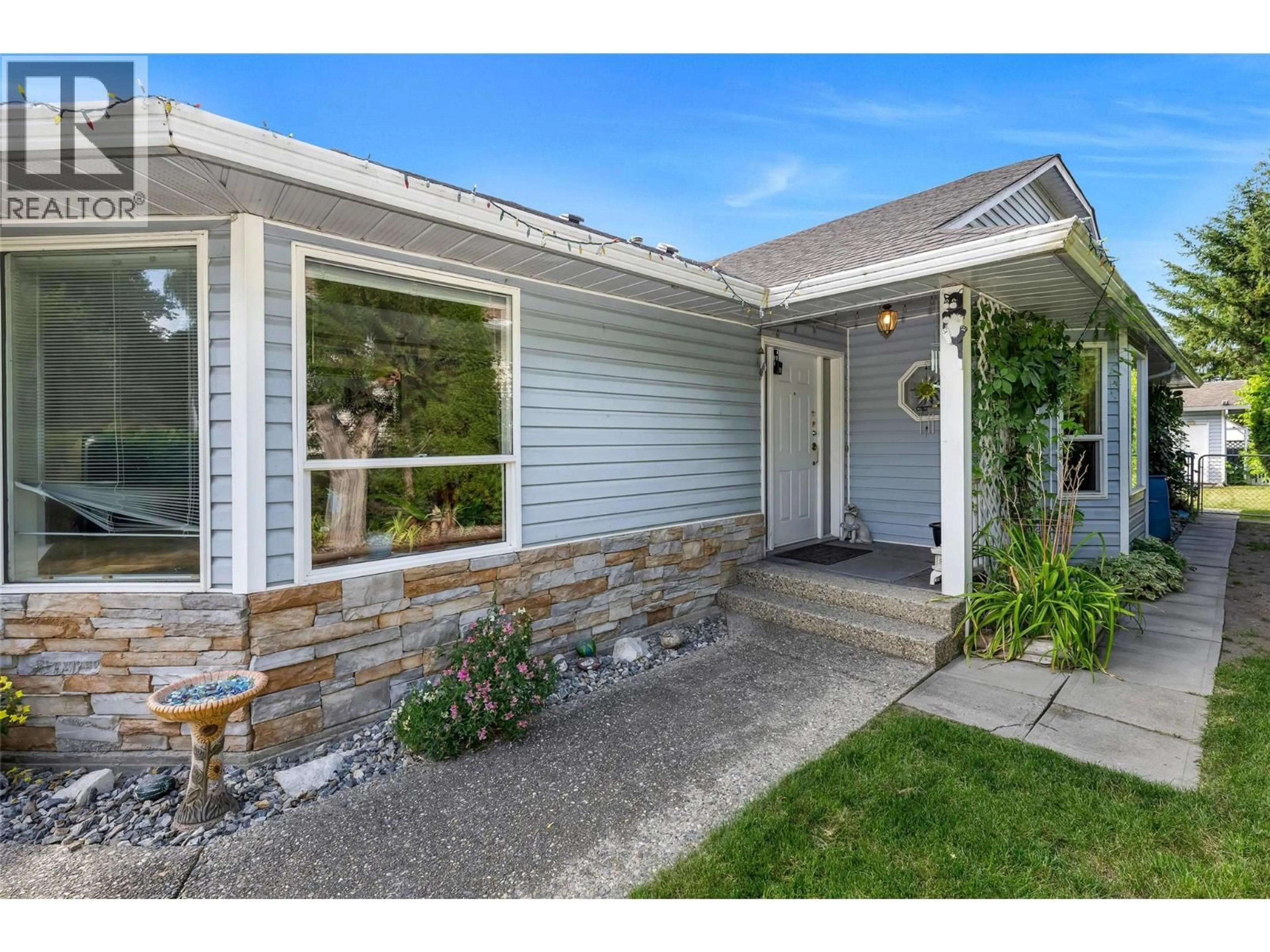 Home with vinyl exterior material, street for 2260 WILSON AVENUE, Armstrong British Columbia V0E1B1