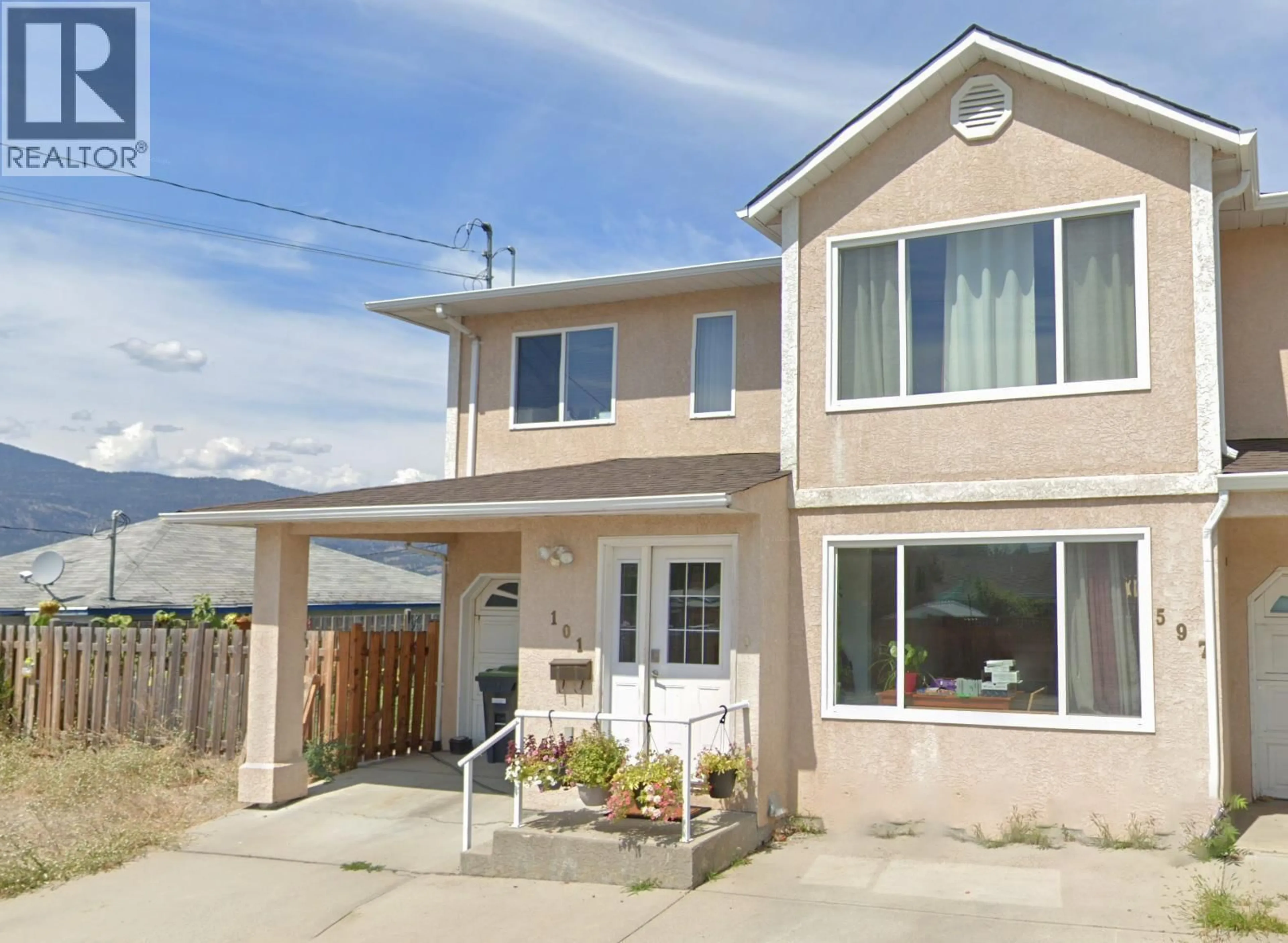 Home with vinyl exterior material, street for 101 - 597 MUNICIPAL AVENUE, Penticton British Columbia V2A2R3