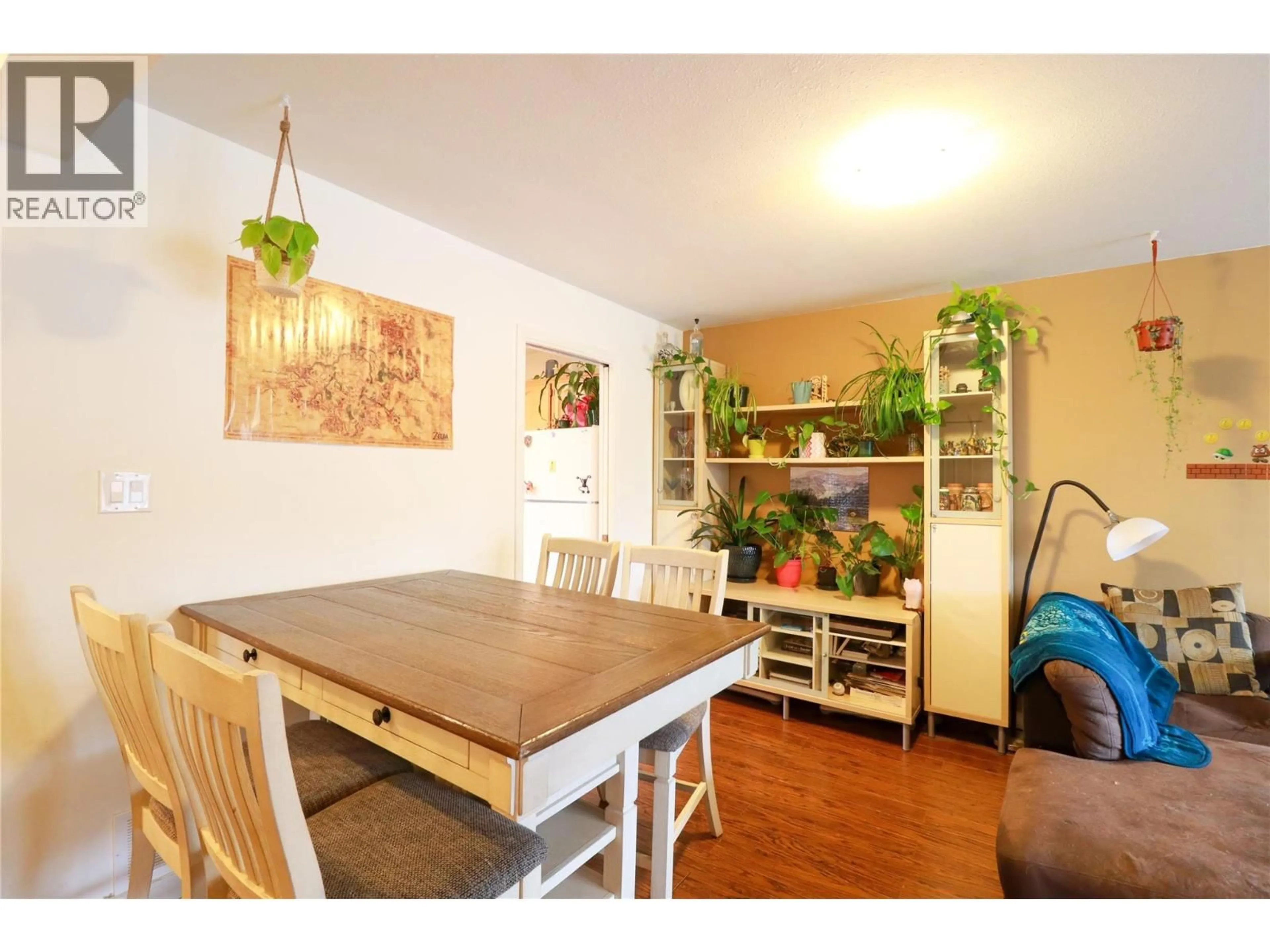 Dining room, wood/laminate floor for 101 - 597 MUNICIPAL AVENUE, Penticton British Columbia V2A2R3