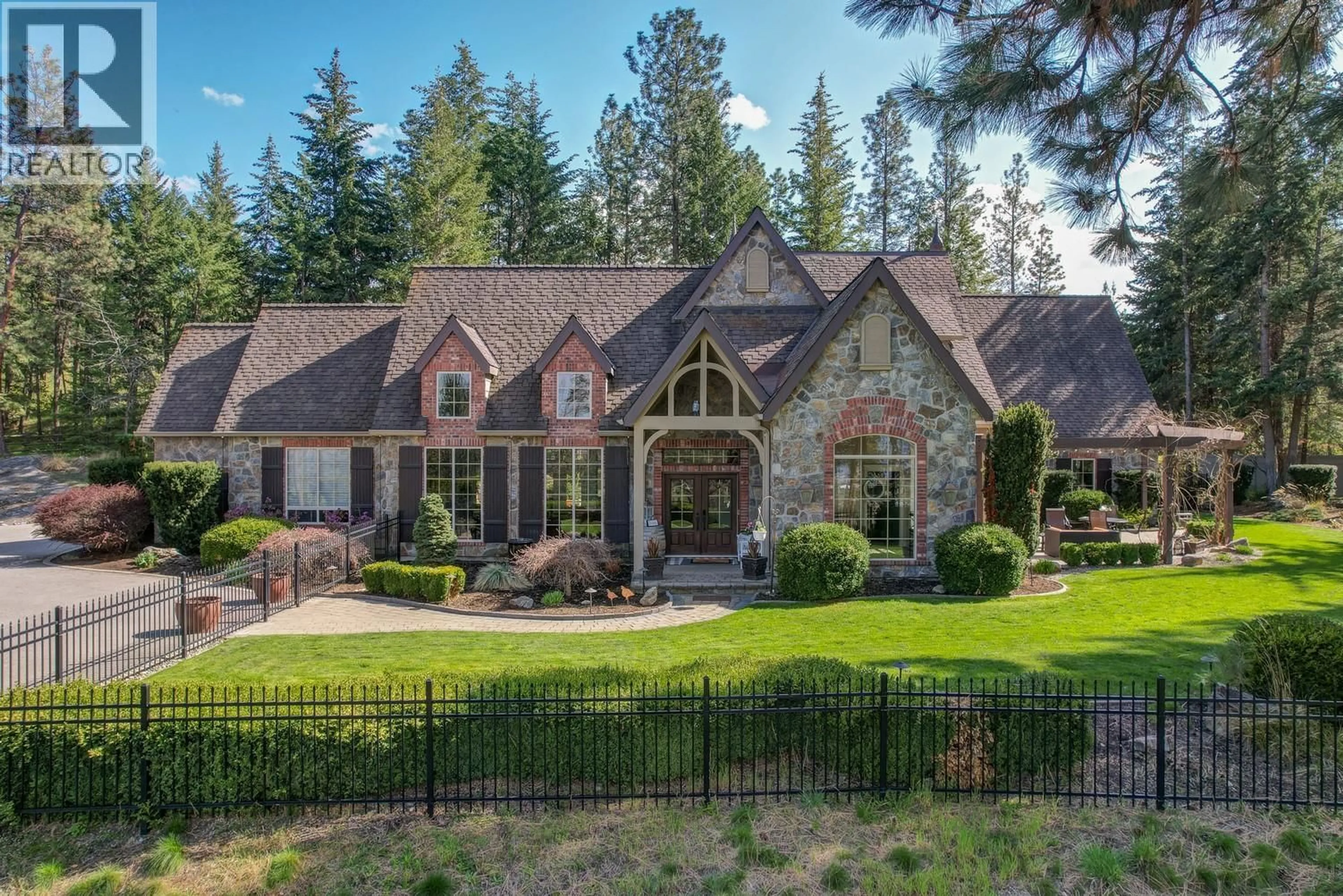 Home with brick exterior material, mountain view for 2957 HARVARD ROAD, Kelowna British Columbia V1W4C2