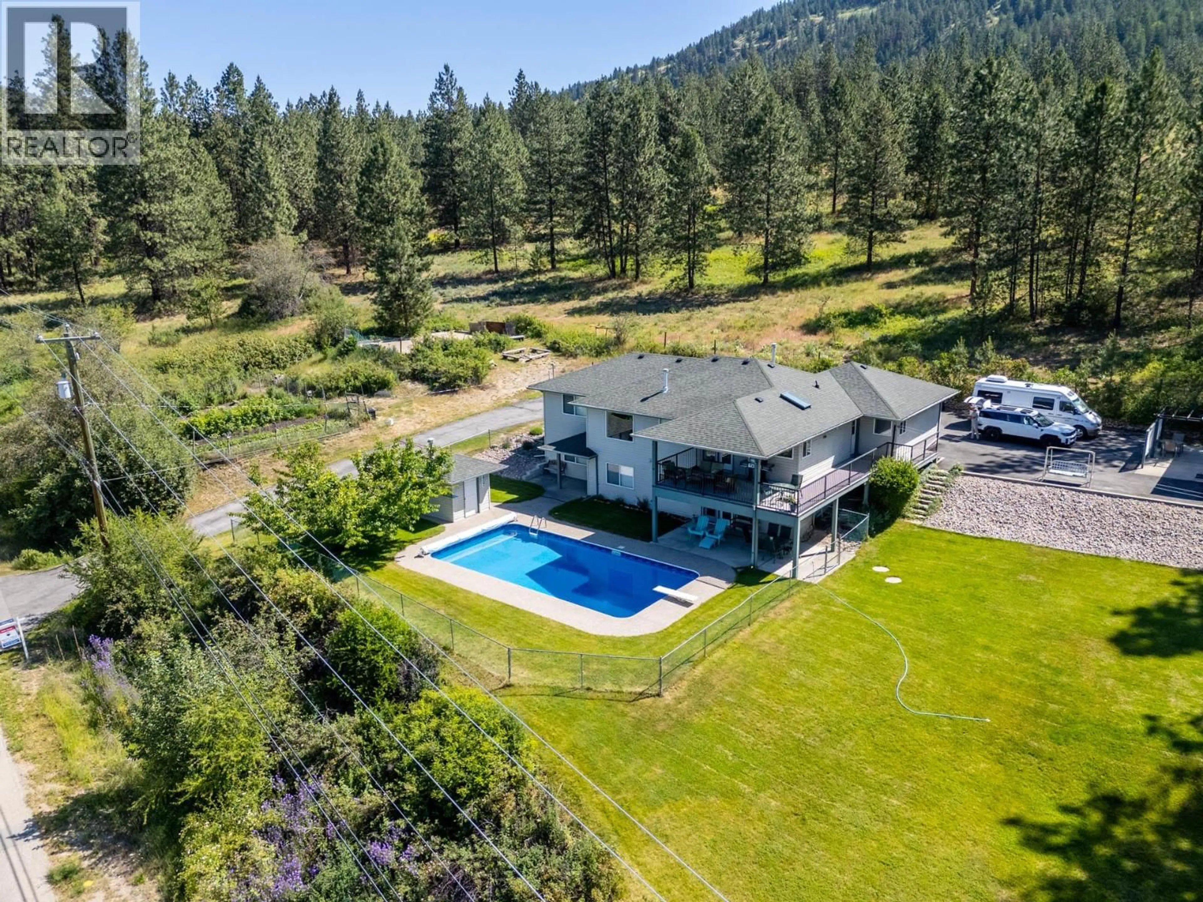 A pic from outside/outdoor area/front of a property/back of a property/a pic from drone, unknown for 16865 COMMONAGE ROAD, Lake Country British Columbia V4V1B5