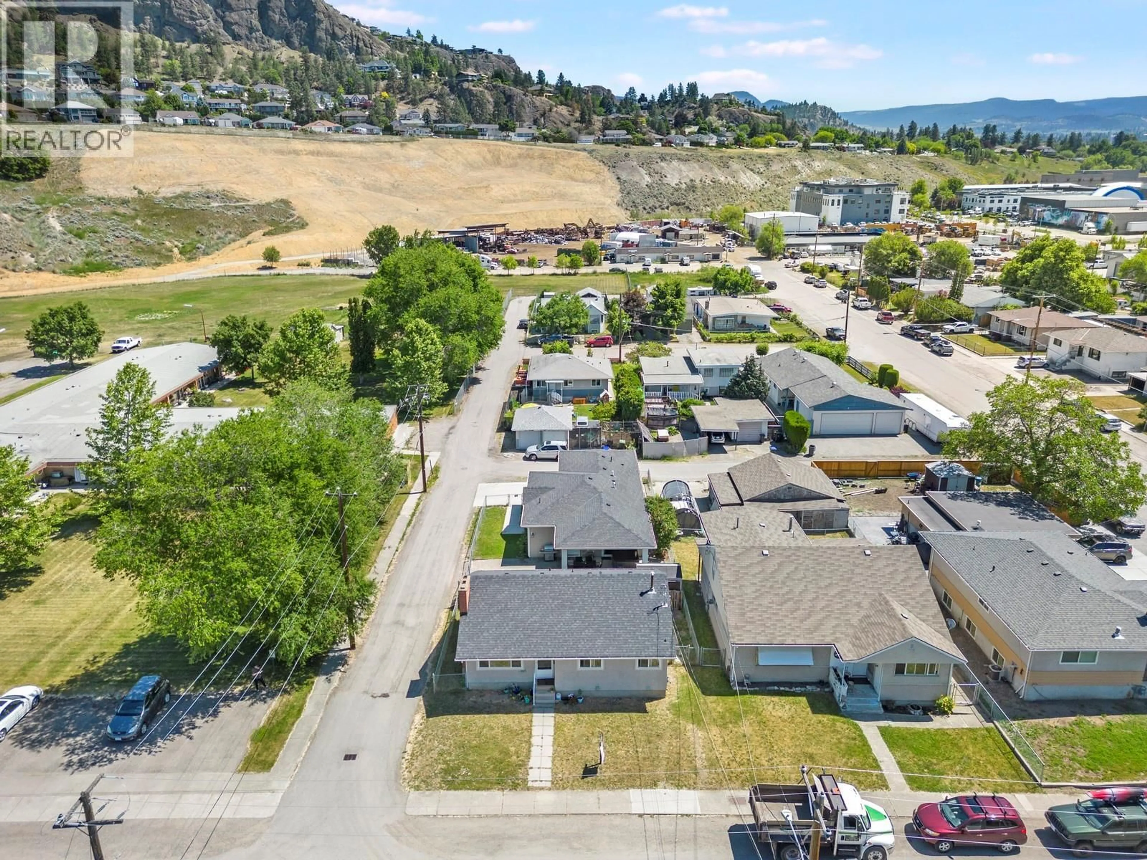 A pic from outside/outdoor area/front of a property/back of a property/a pic from drone, street for 875-877 JONES STREET, Kelowna British Columbia V1Y2S6