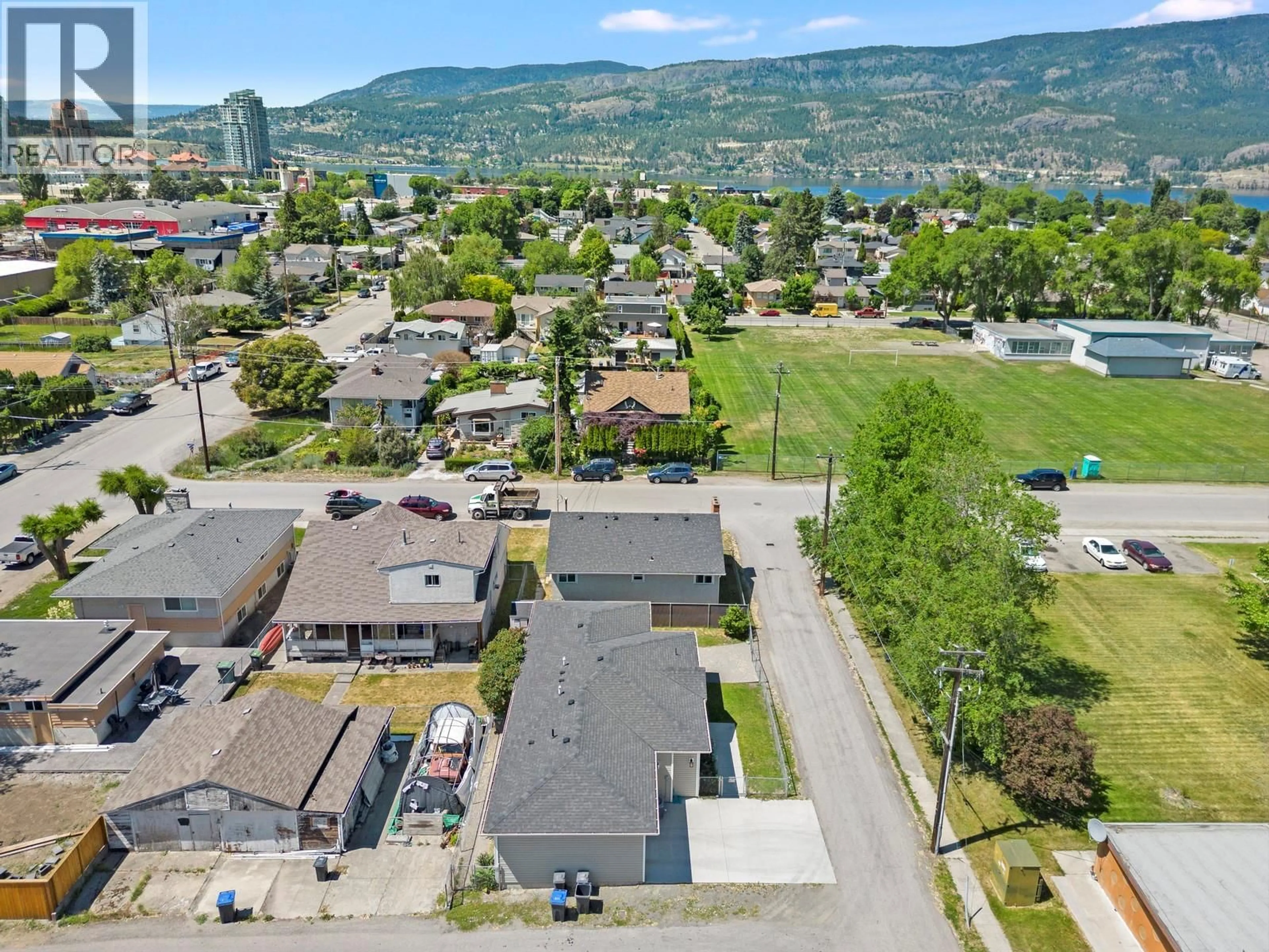 A pic from outside/outdoor area/front of a property/back of a property/a pic from drone, mountain view for 875-877 JONES STREET, Kelowna British Columbia V1Y2S6