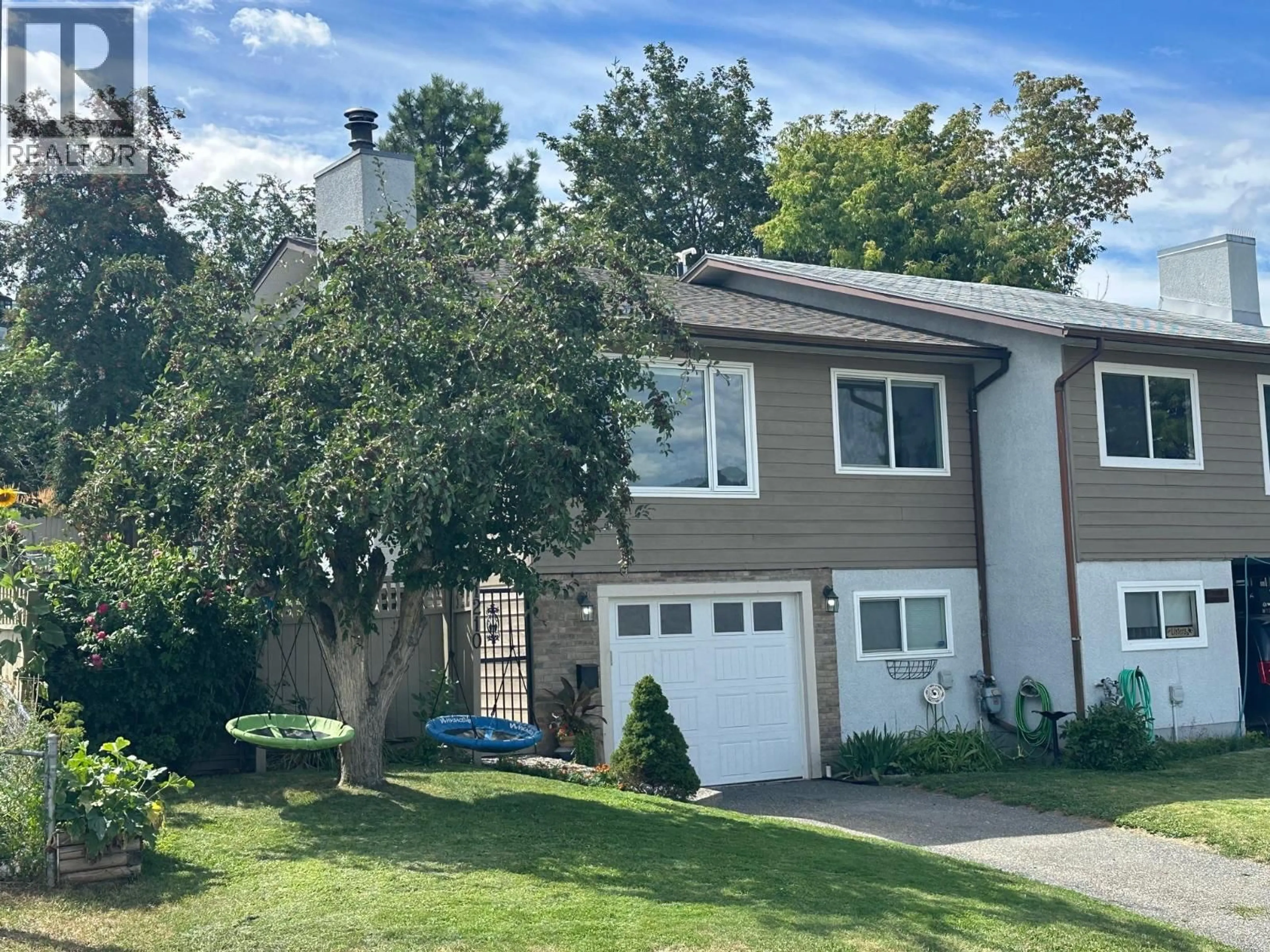 Home with vinyl exterior material, street for 1210 MONASHEE COURT, Kamloops British Columbia V2C6B3