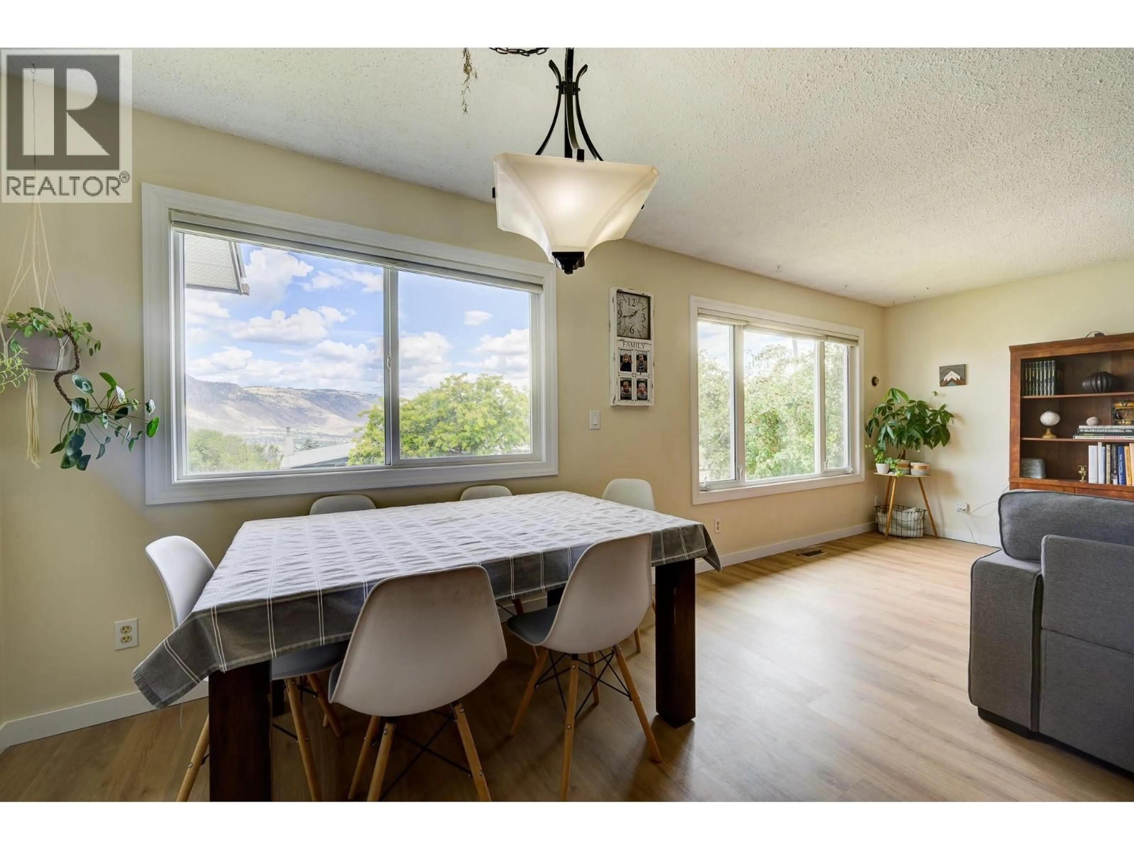 Dining room, wood/laminate floor for 1210 MONASHEE COURT, Kamloops British Columbia V2C6B3