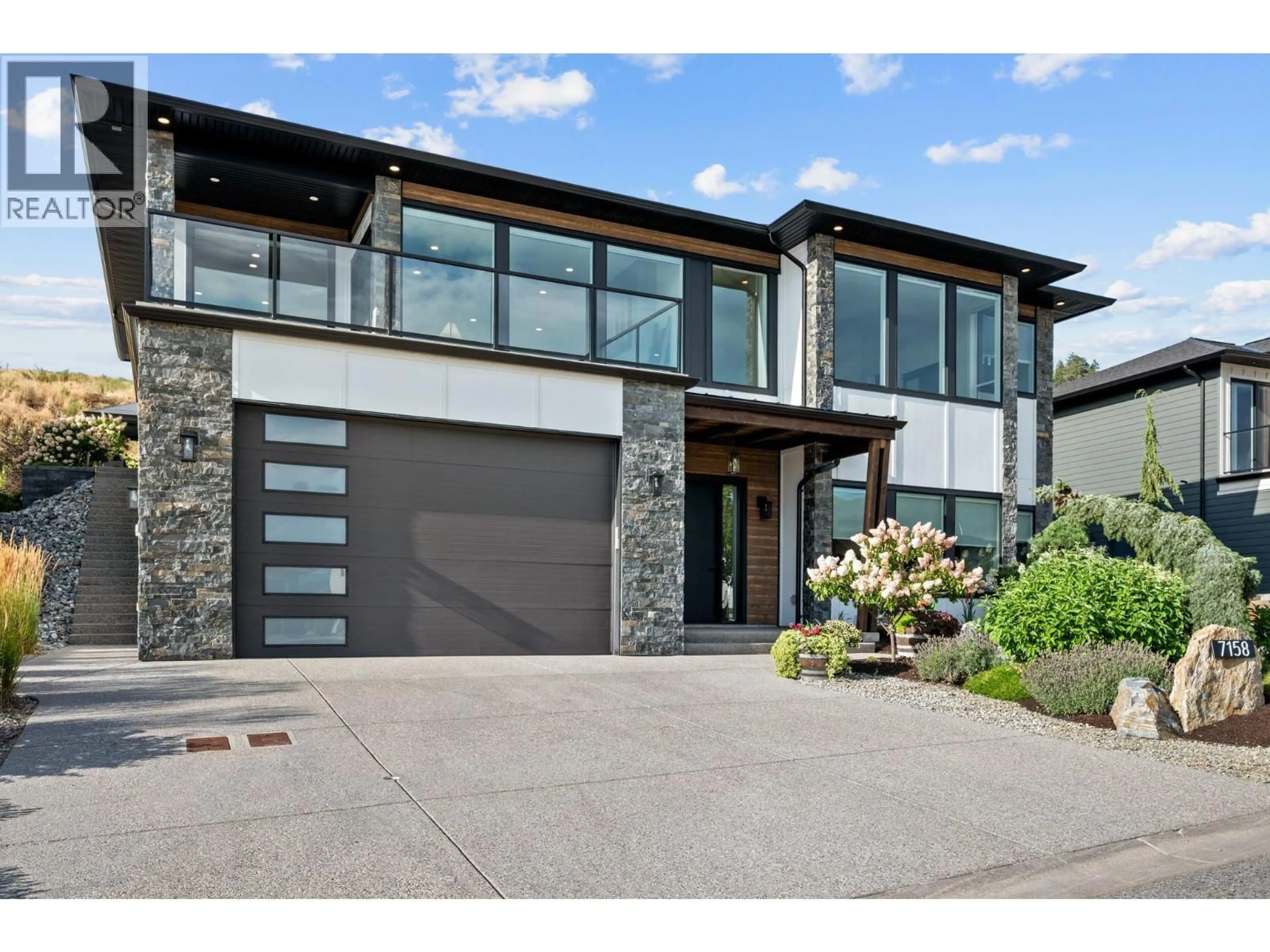 Home with brick exterior material, street for 7158 APEX DRIVE, Vernon British Columbia V1B4E4
