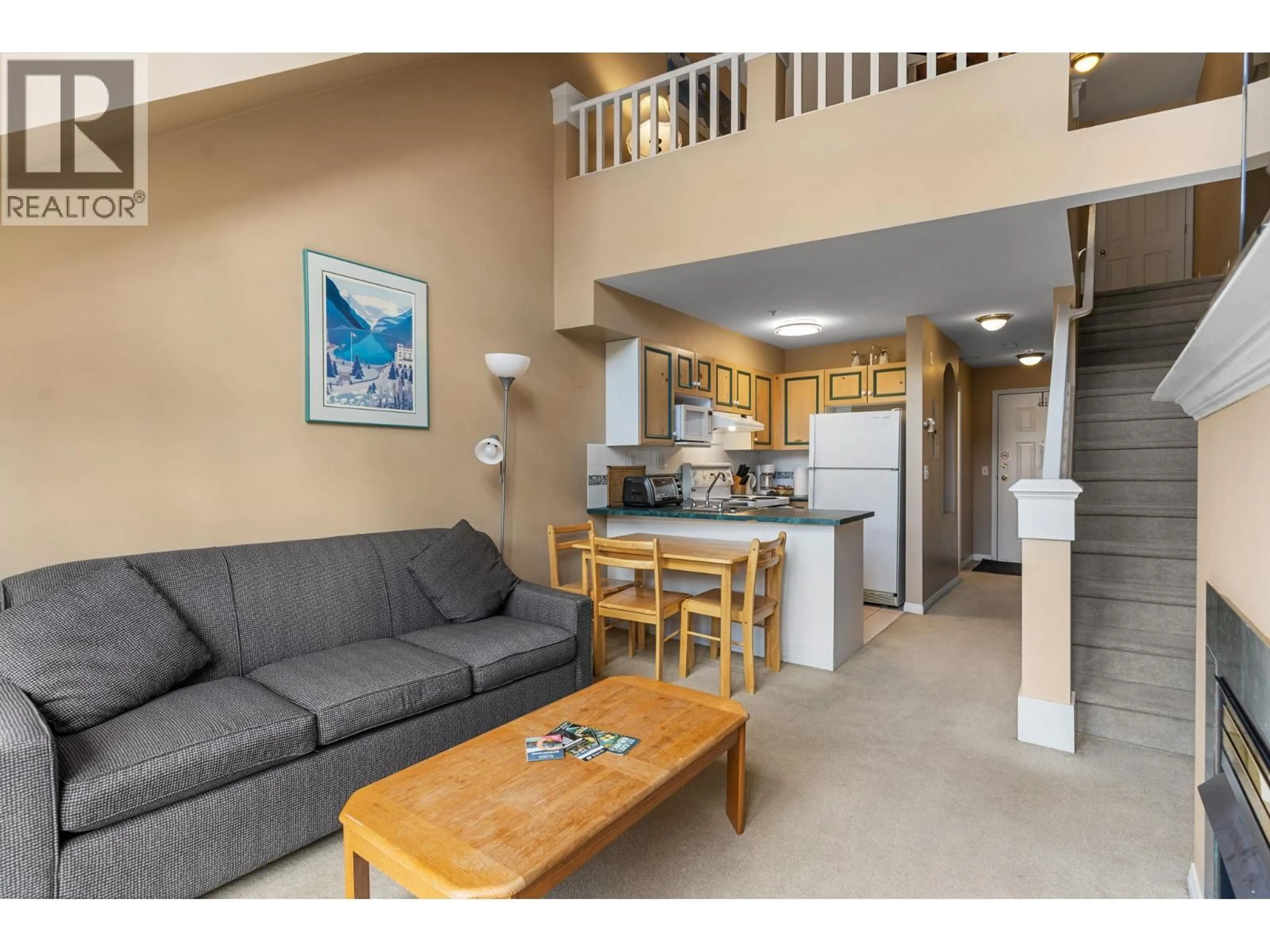 Living room with furniture, unknown for 318 - 3185 VIA CENTRALE OTHER, Kelowna British Columbia V1V2A7
