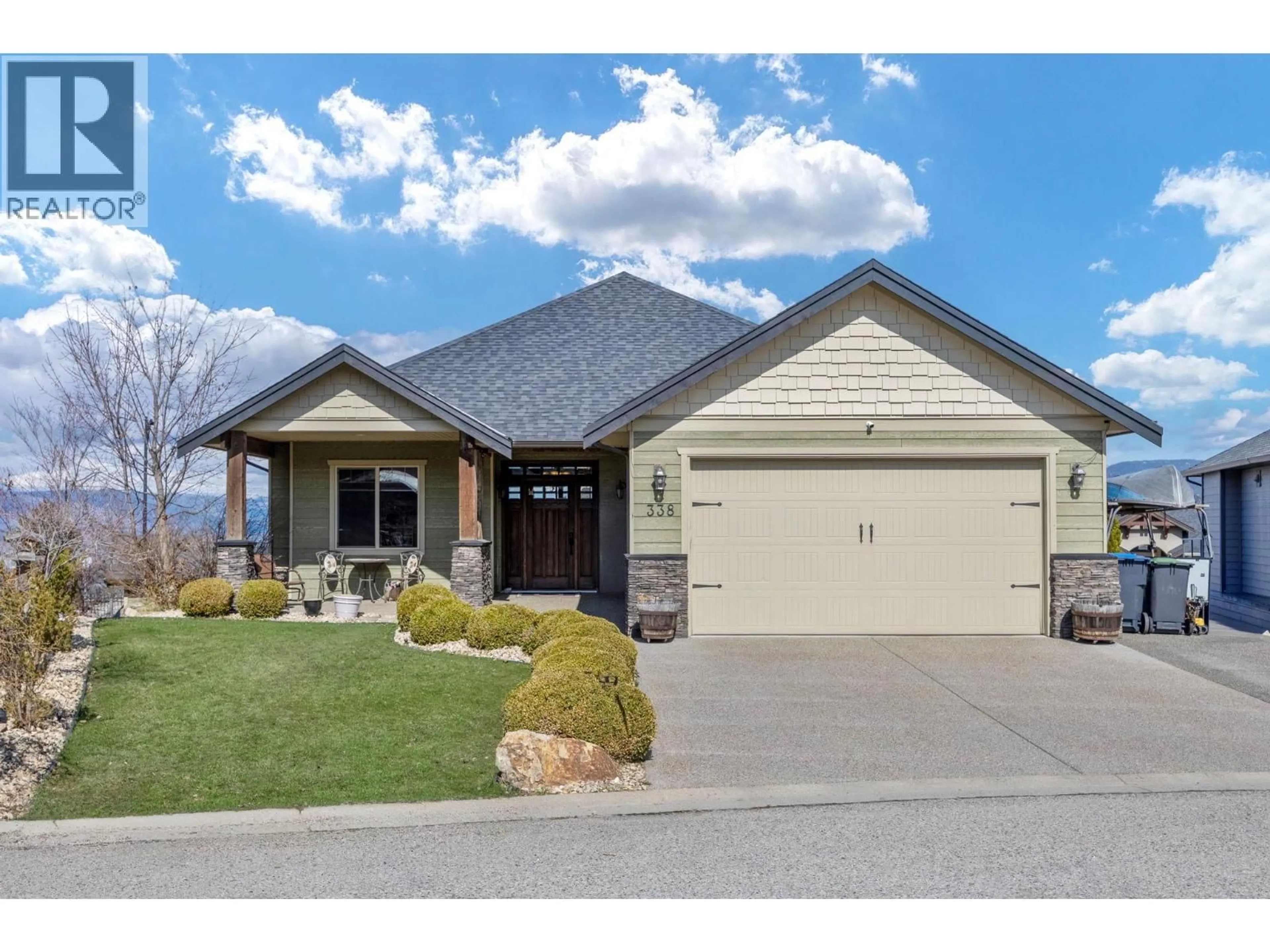Home with vinyl exterior material, street for 338 PRESTWICK LANE, Kelowna British Columbia V1P1R7