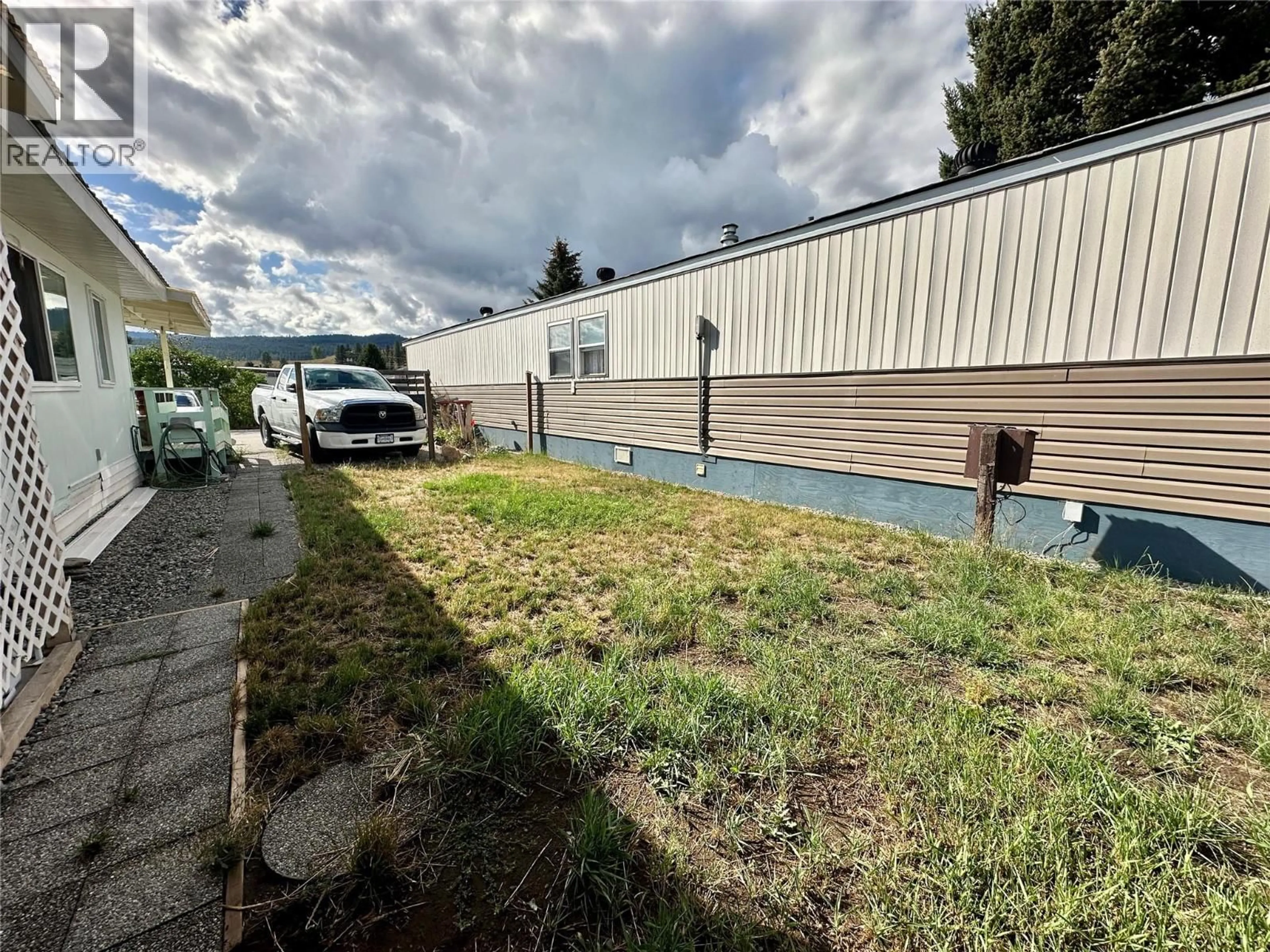 A pic from outside/outdoor area/front of a property/back of a property/a pic from drone, unknown for 32 - 263 HWY 3 HIGHWAY, Princeton British Columbia V0X1W0