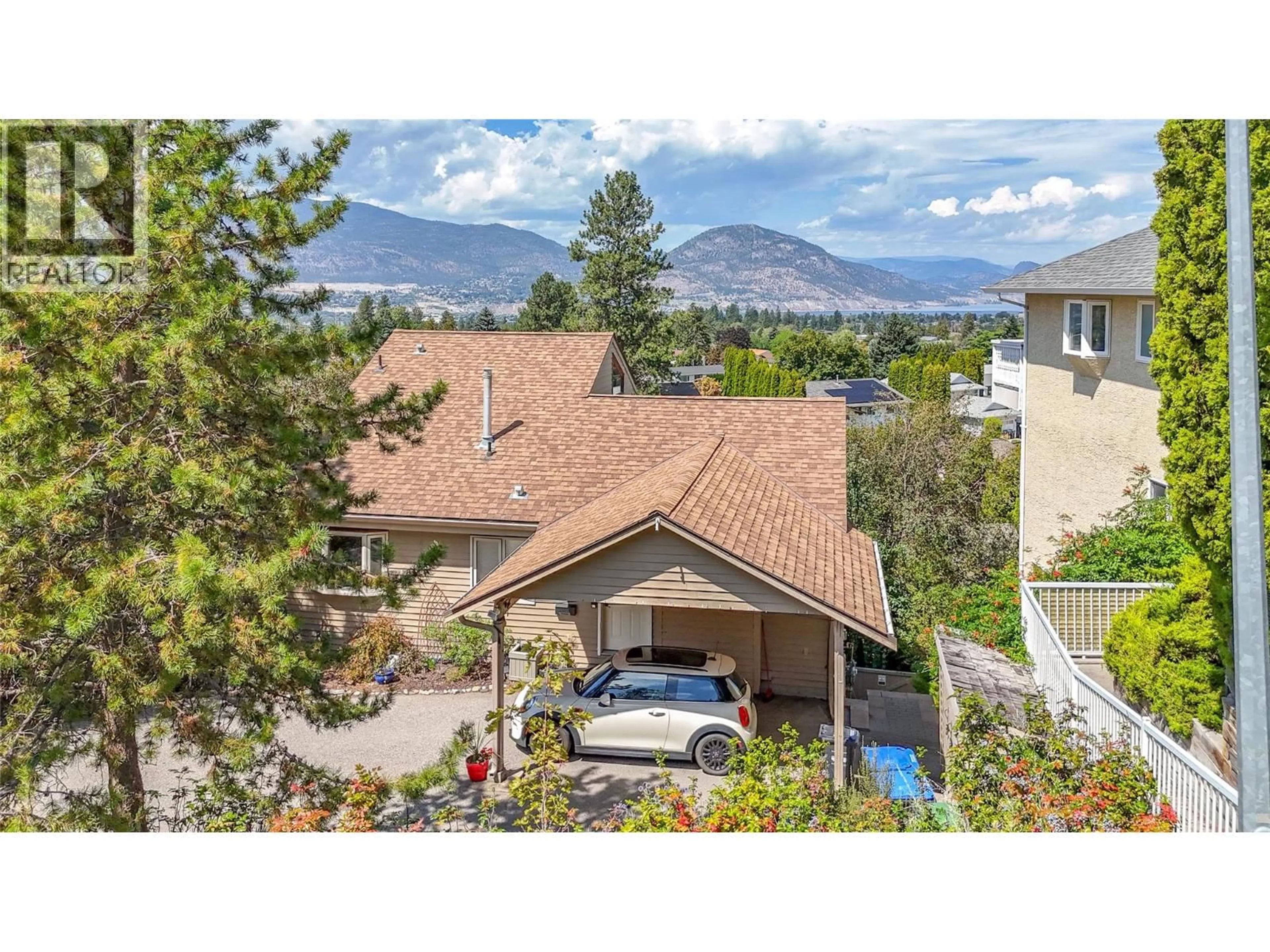 A pic from outside/outdoor area/front of a property/back of a property/a pic from drone, mountain view for 186 DEWDNEY CRESCENT, Penticton British Columbia V2A7Z6