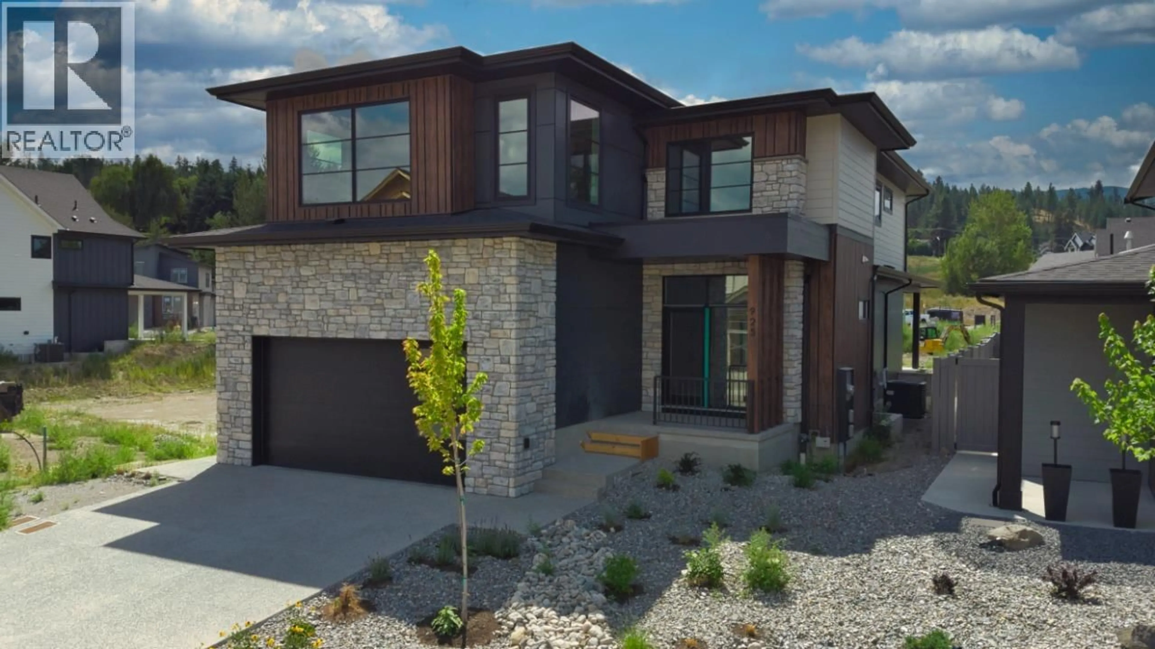 Home with brick exterior material, street for 925 BULL CRESCENT, Kelowna British Columbia V1W0E6