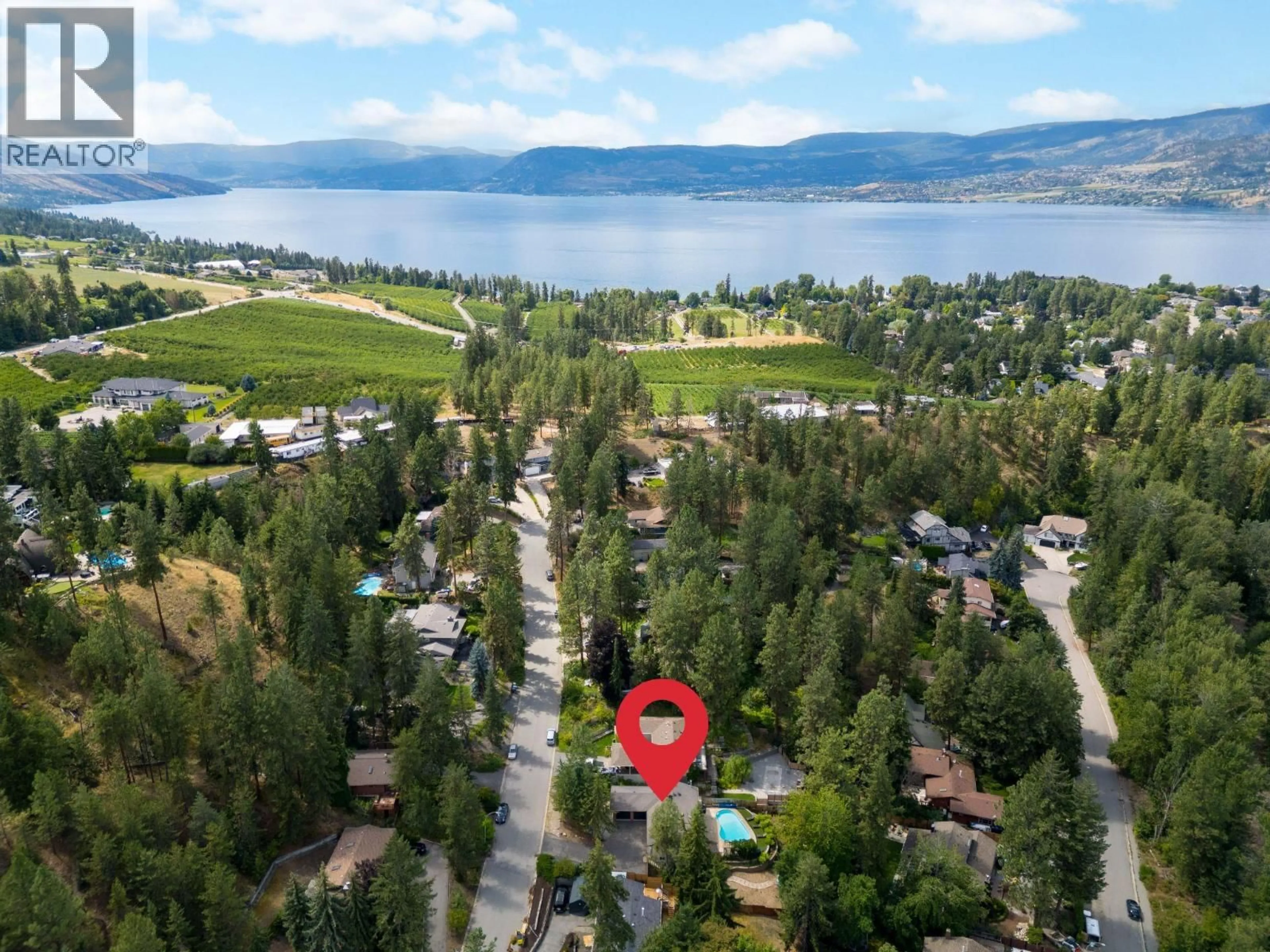 A pic from outside/outdoor area/front of a property/back of a property/a pic from drone, mountain view for 636 THORNELOE ROAD, Kelowna British Columbia V1W4P6