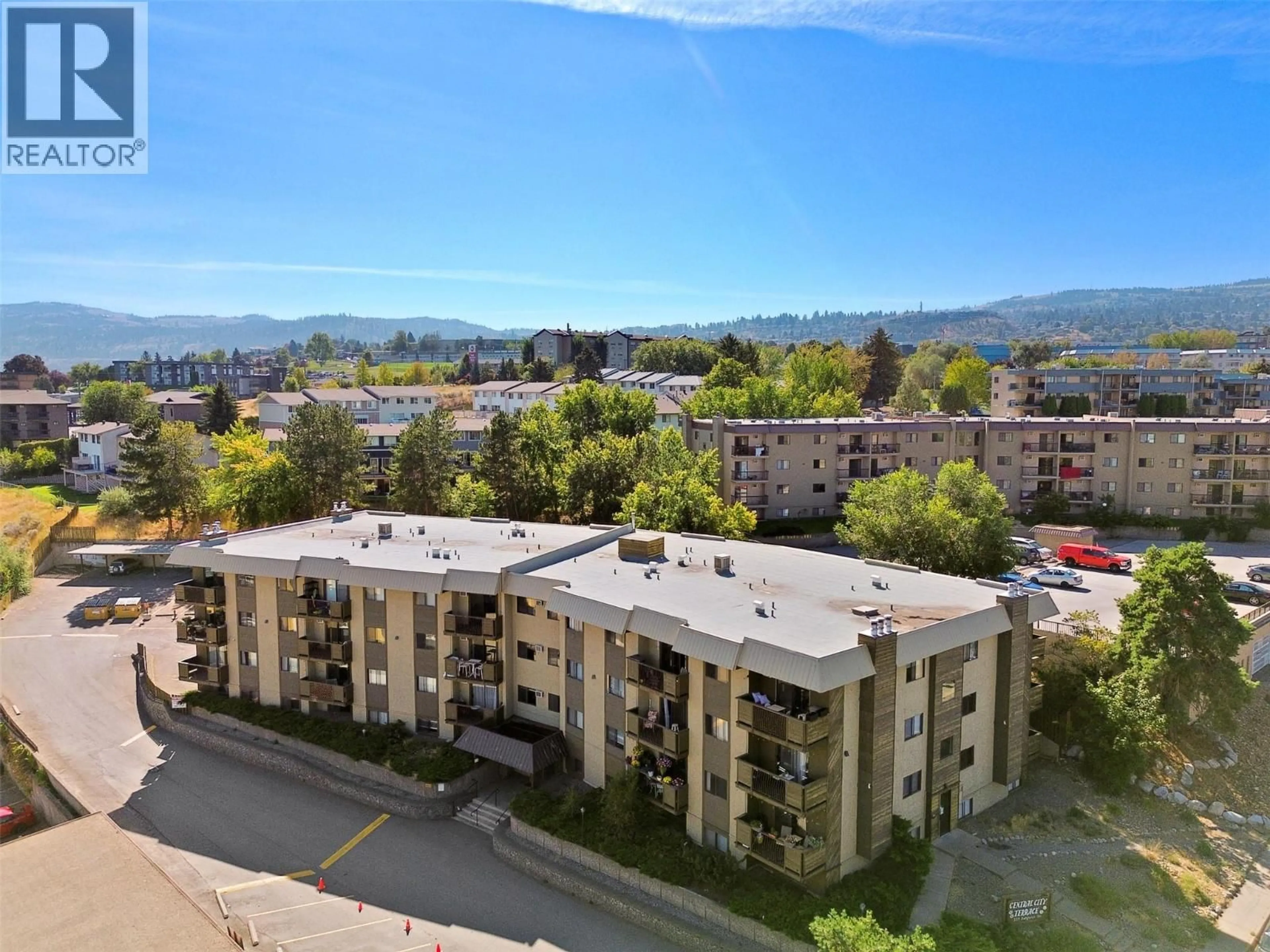 A pic from outside/outdoor area/front of a property/back of a property/a pic from drone, mountain view for 202 - 555 DALGLEISH DRIVE, Kamloops British Columbia V2C6C7