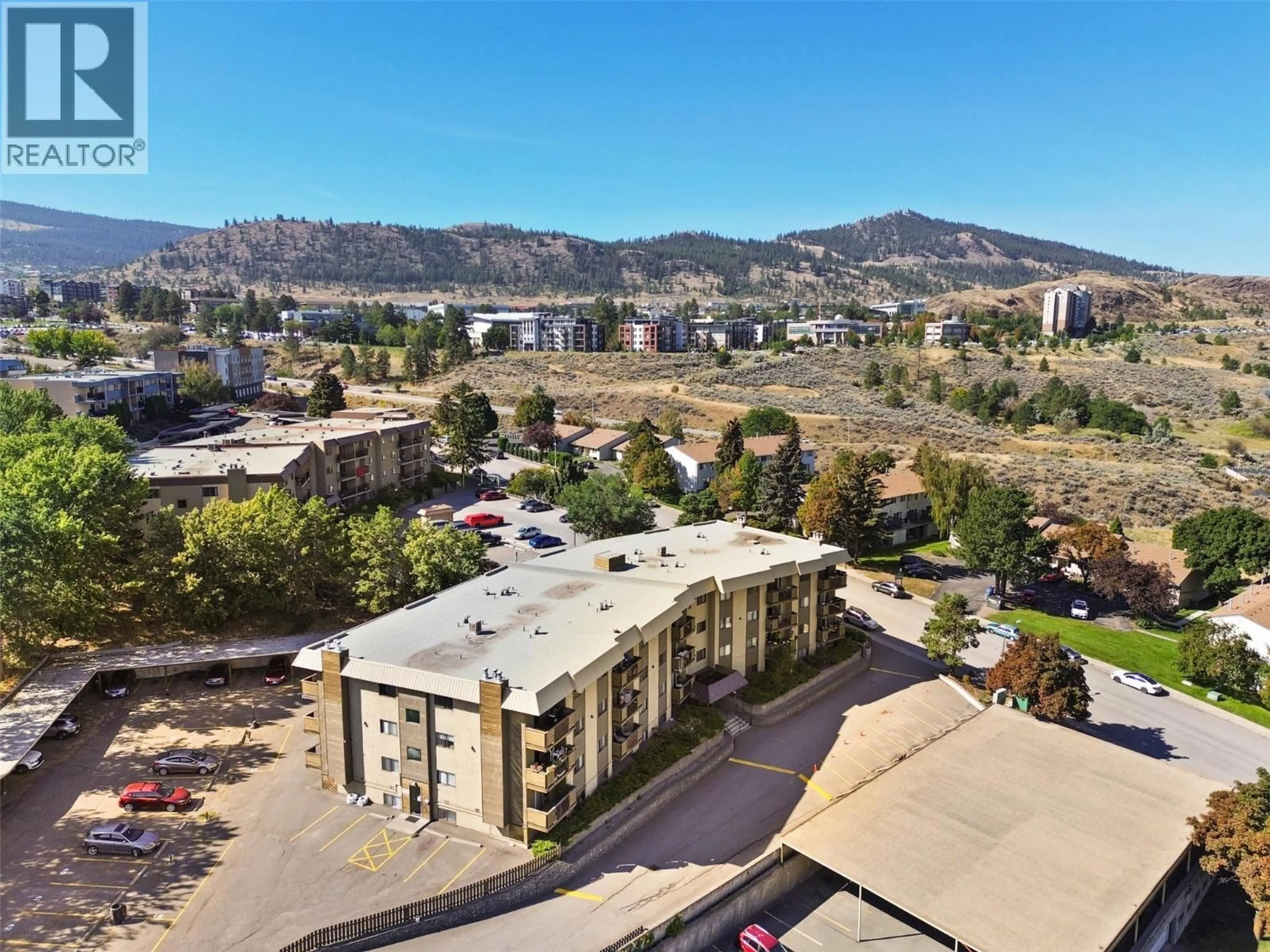 A pic from outside/outdoor area/front of a property/back of a property/a pic from drone, mountain view for 202 - 555 DALGLEISH DRIVE, Kamloops British Columbia V2C6C7