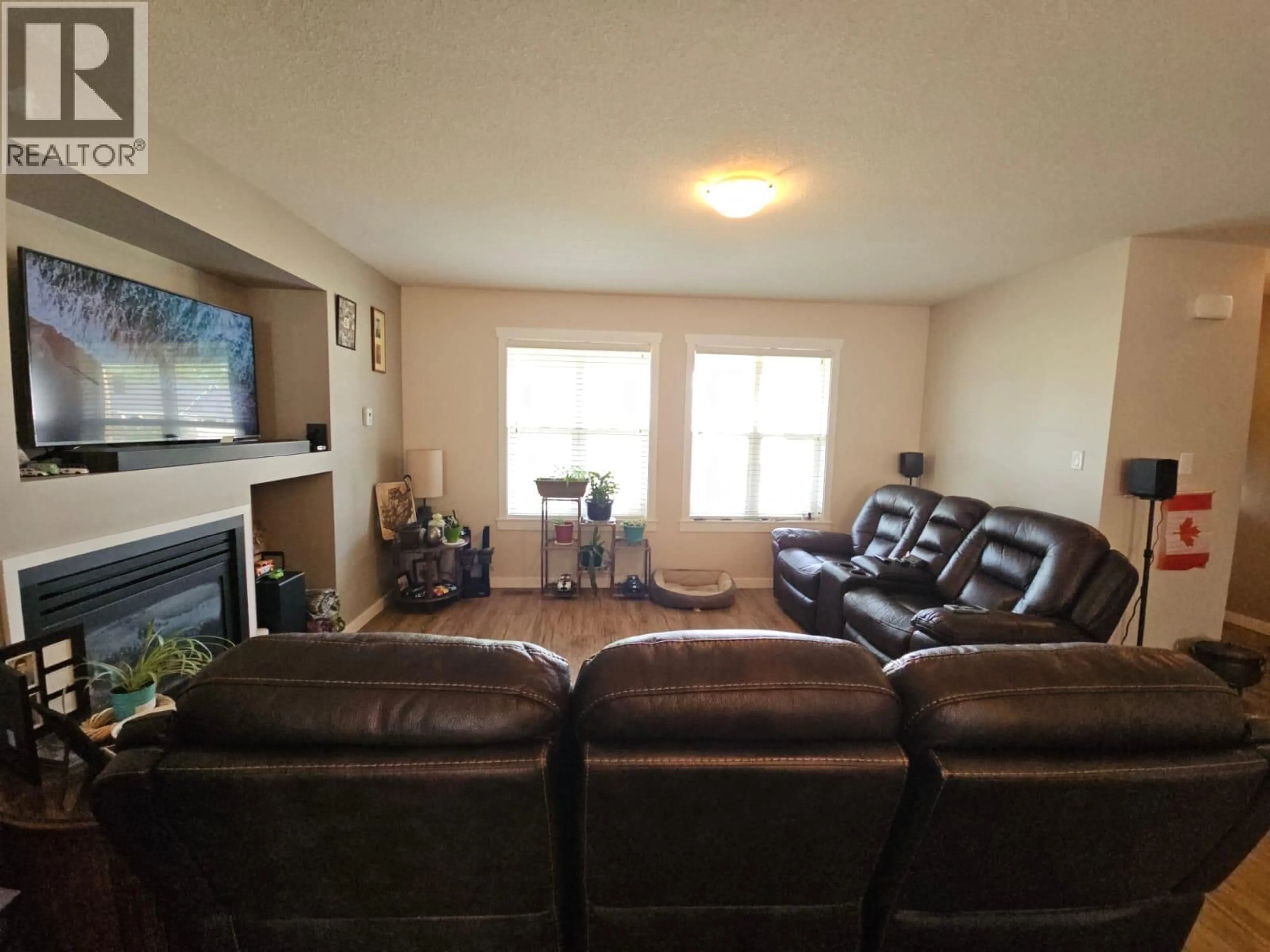 Living room with furniture, unknown for 5214 41 STREET NORTHEAST, Chetwynd British Columbia V0C1J0
