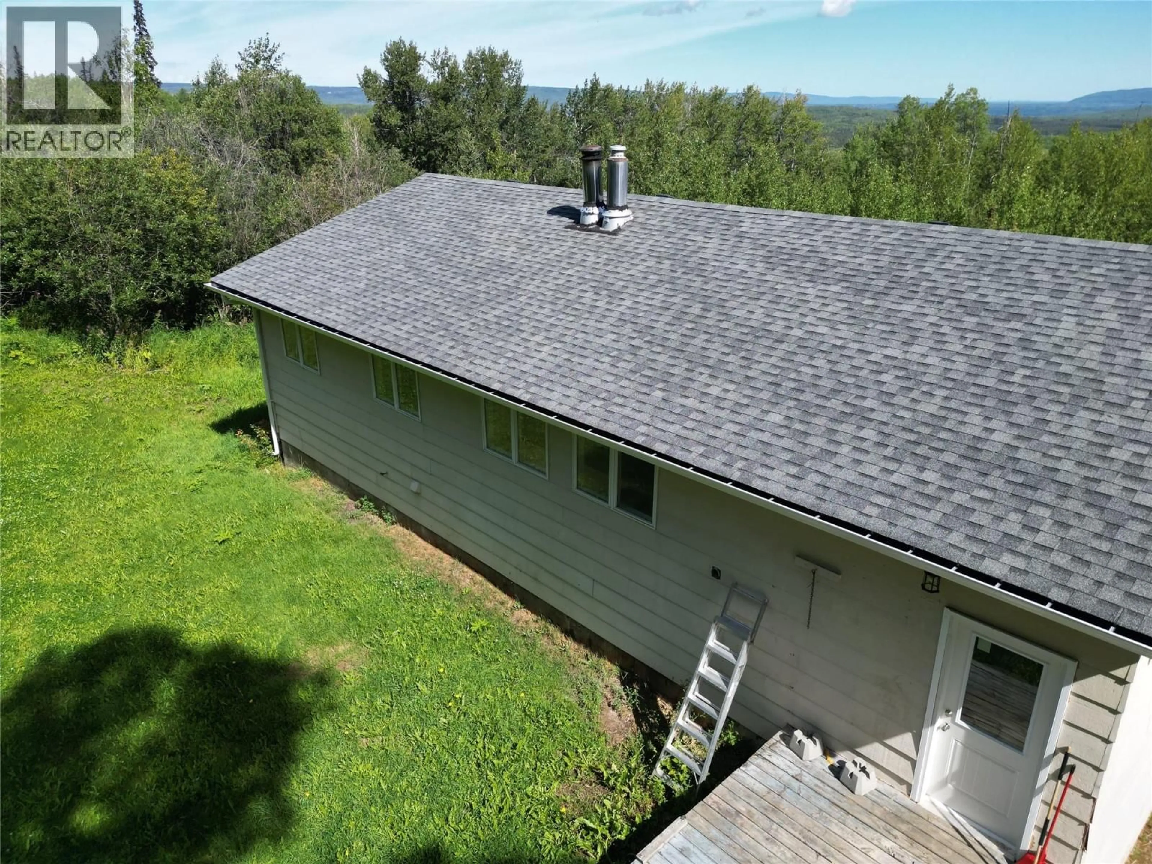 A pic from outside/outdoor area/front of a property/back of a property/a pic from drone, unknown for 3511 SPRUCE ROAD, Chetwynd British Columbia V0C1J0