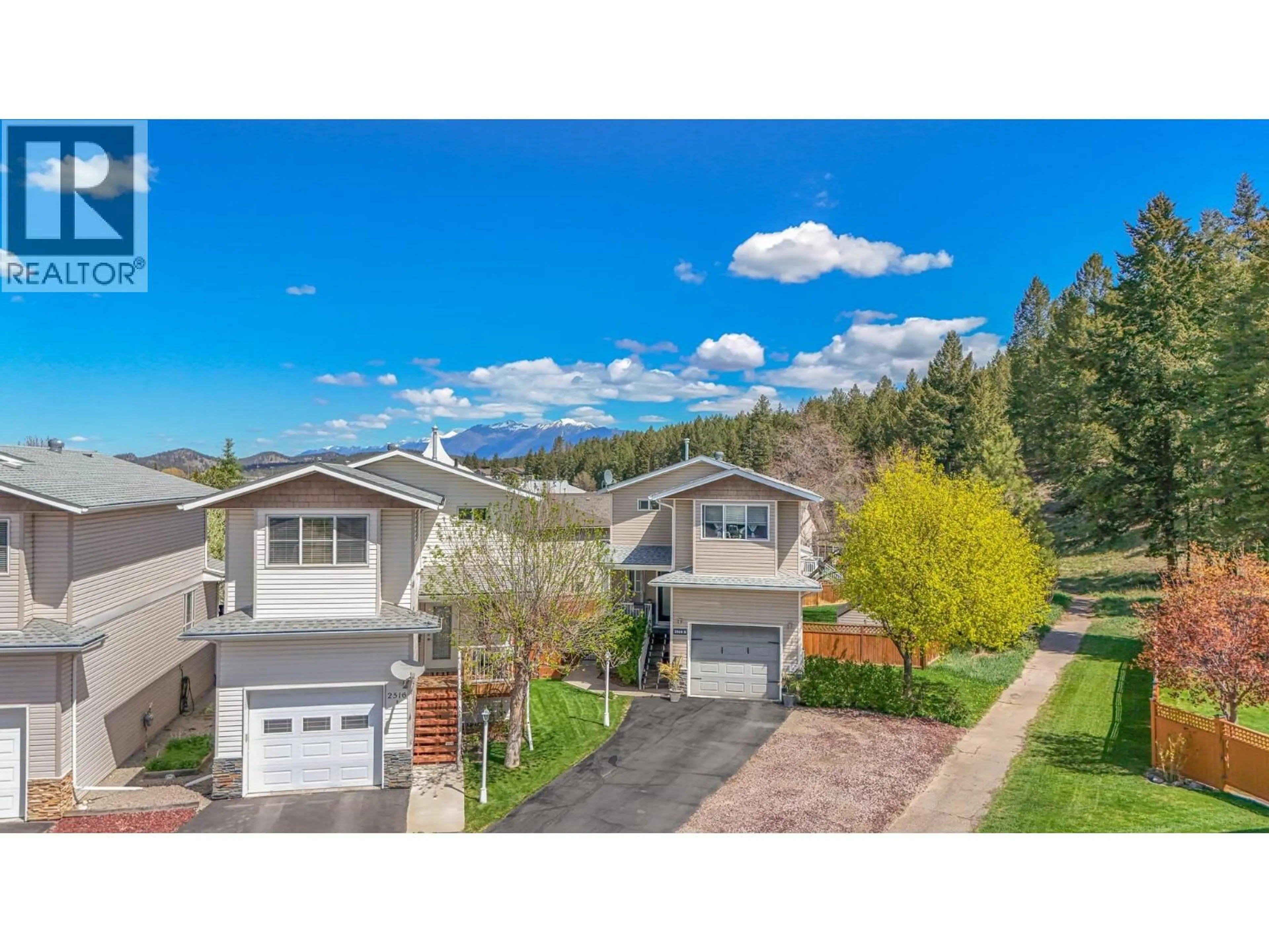 A pic from outside/outdoor area/front of a property/back of a property/a pic from drone, mountain view for 2516b MCLEARY CRESCENT NORTH, Cranbrook British Columbia V1C6R7